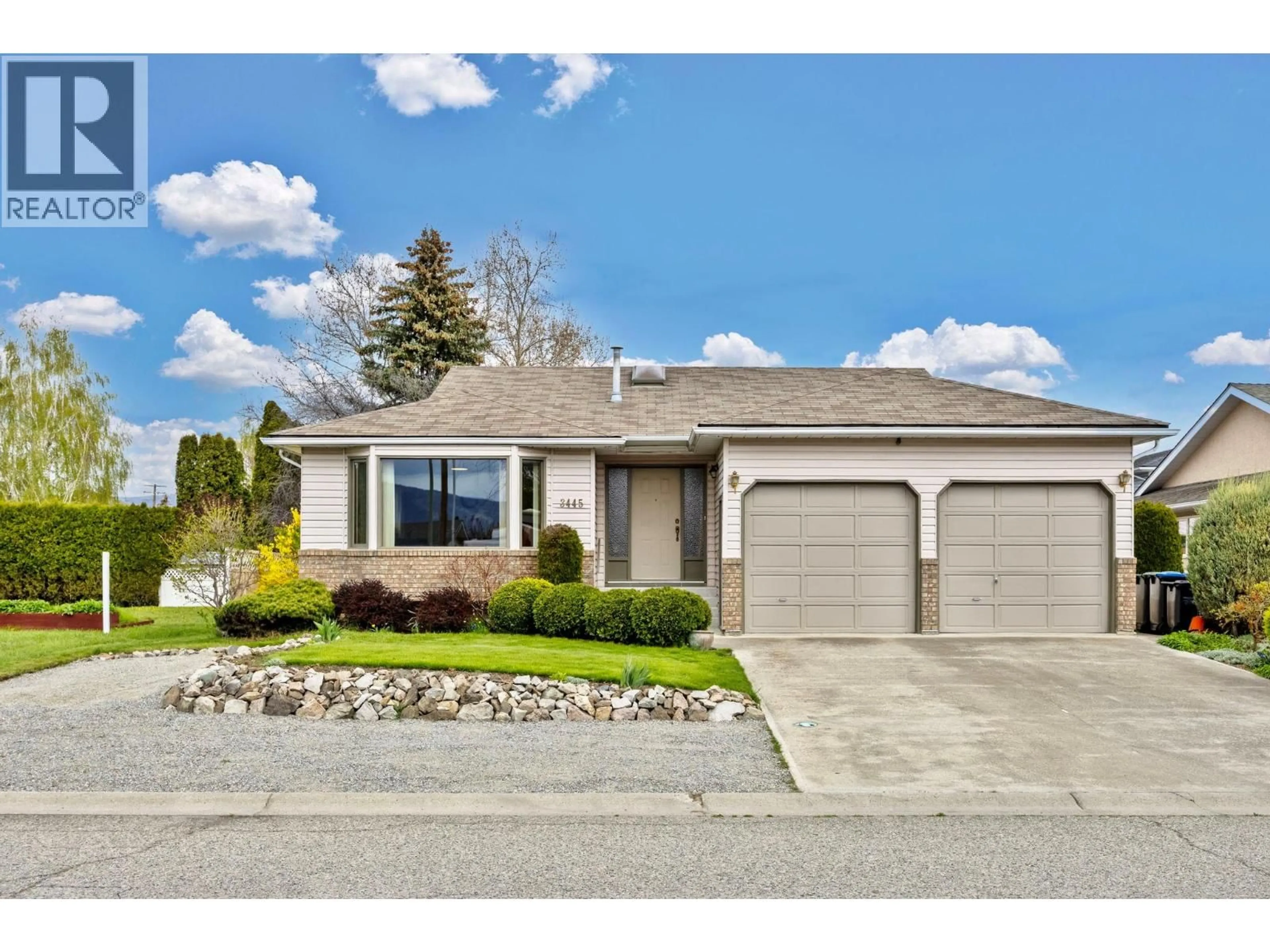 Home with vinyl exterior material, street for 3445 BARBERRY STREET, Kelowna British Columbia V1W3V6