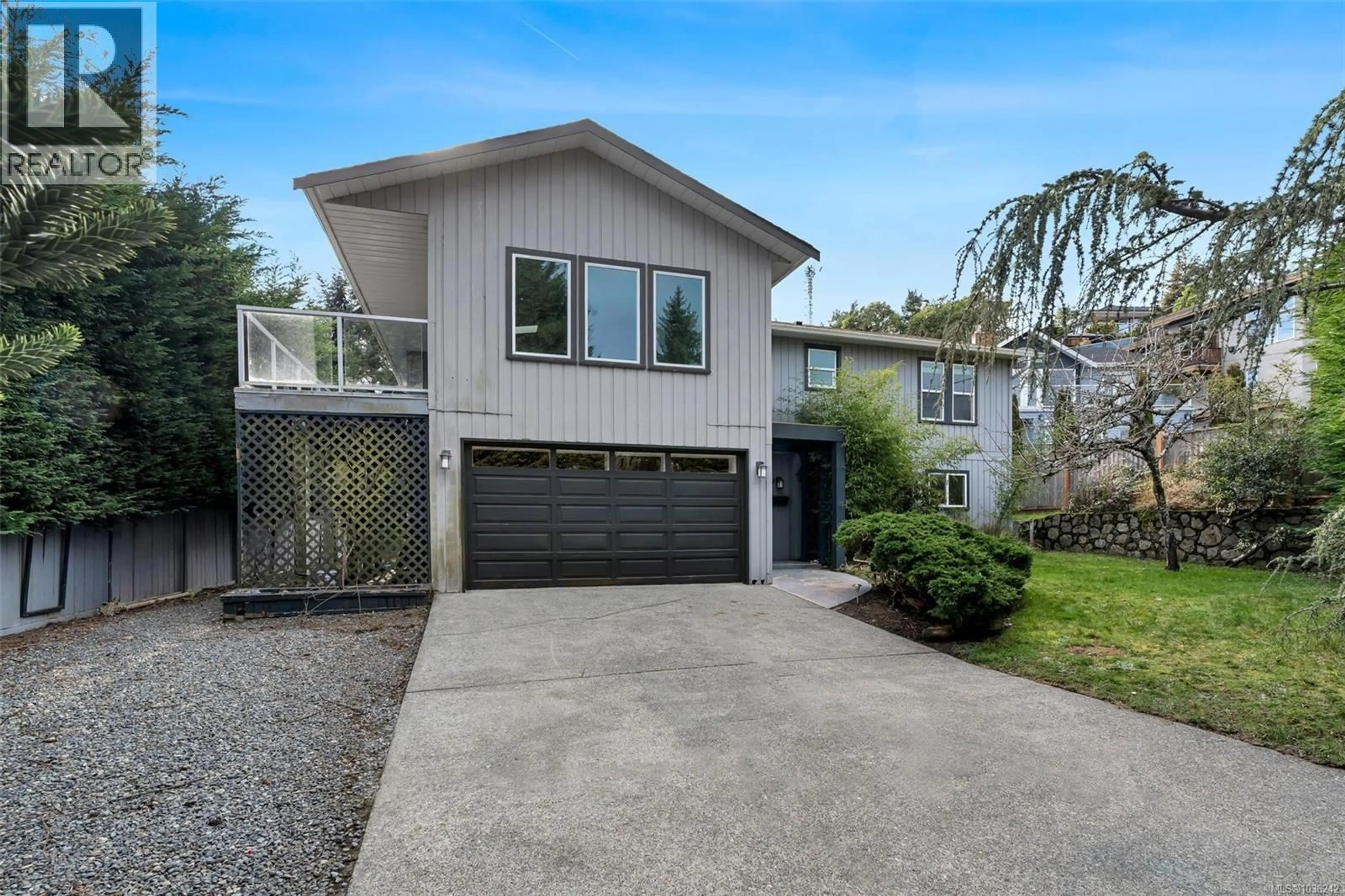 Home with vinyl exterior material, street for 711 BEXHILL ROAD, Colwood British Columbia V9C3P9
