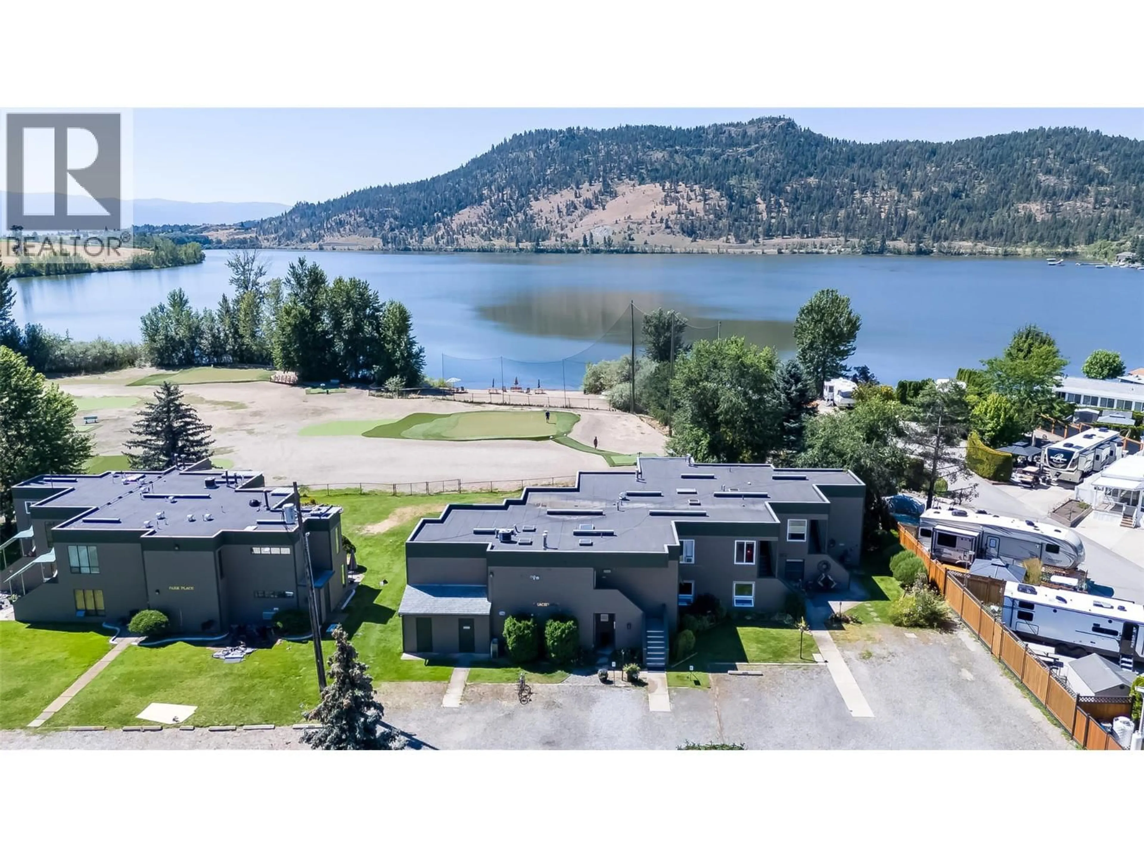A pic from outside/outdoor area/front of a property/back of a property/a pic from drone, water/lake/river/ocean view for 3206 - 415 COMMONWEALTH ROAD, Kelowna British Columbia V4V2M4