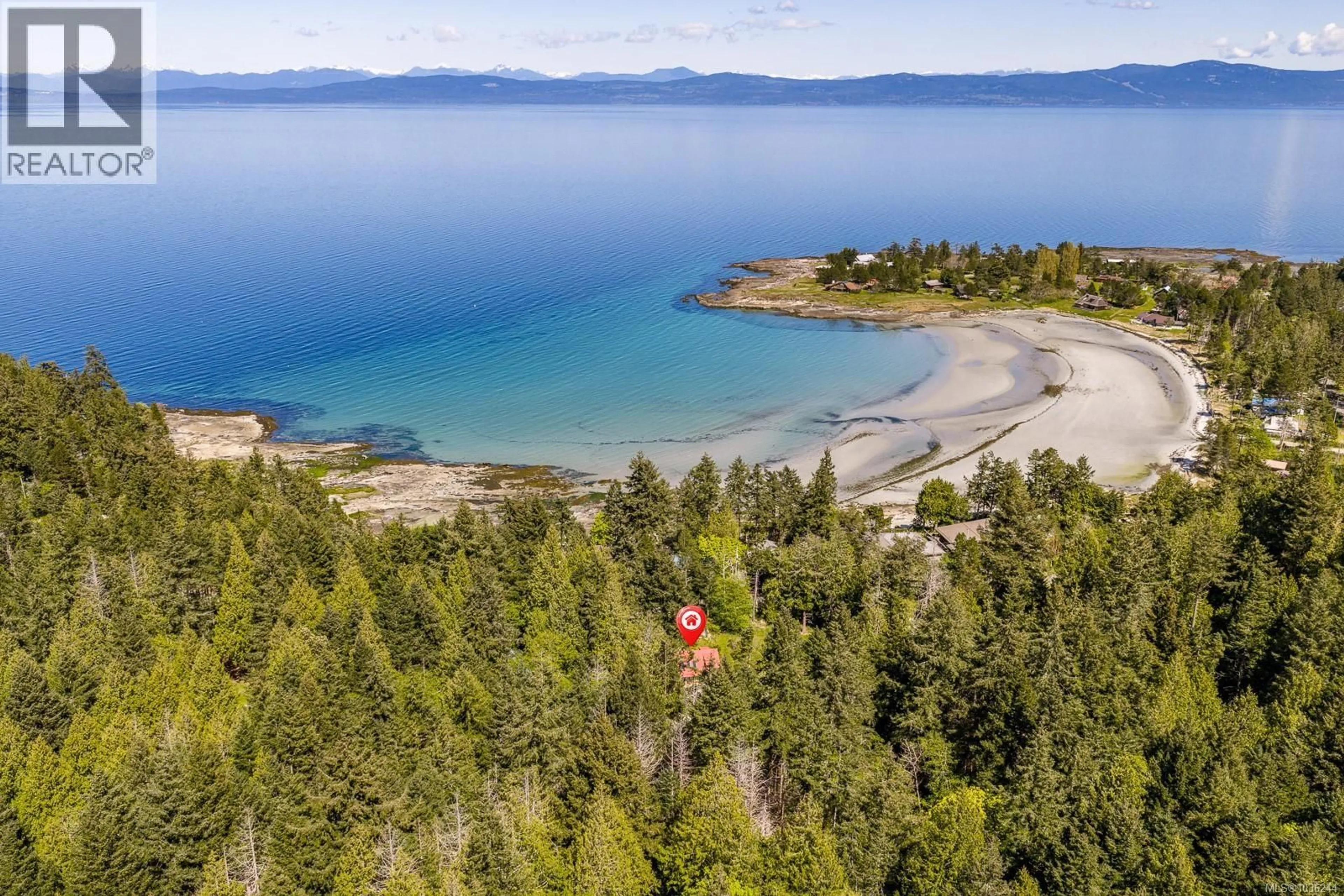 A pic from outside/outdoor area/front of a property/back of a property/a pic from drone, water/lake/river/ocean view for 7670 ANDERSON DRIVE, Hornby Island British Columbia V0R1Z0