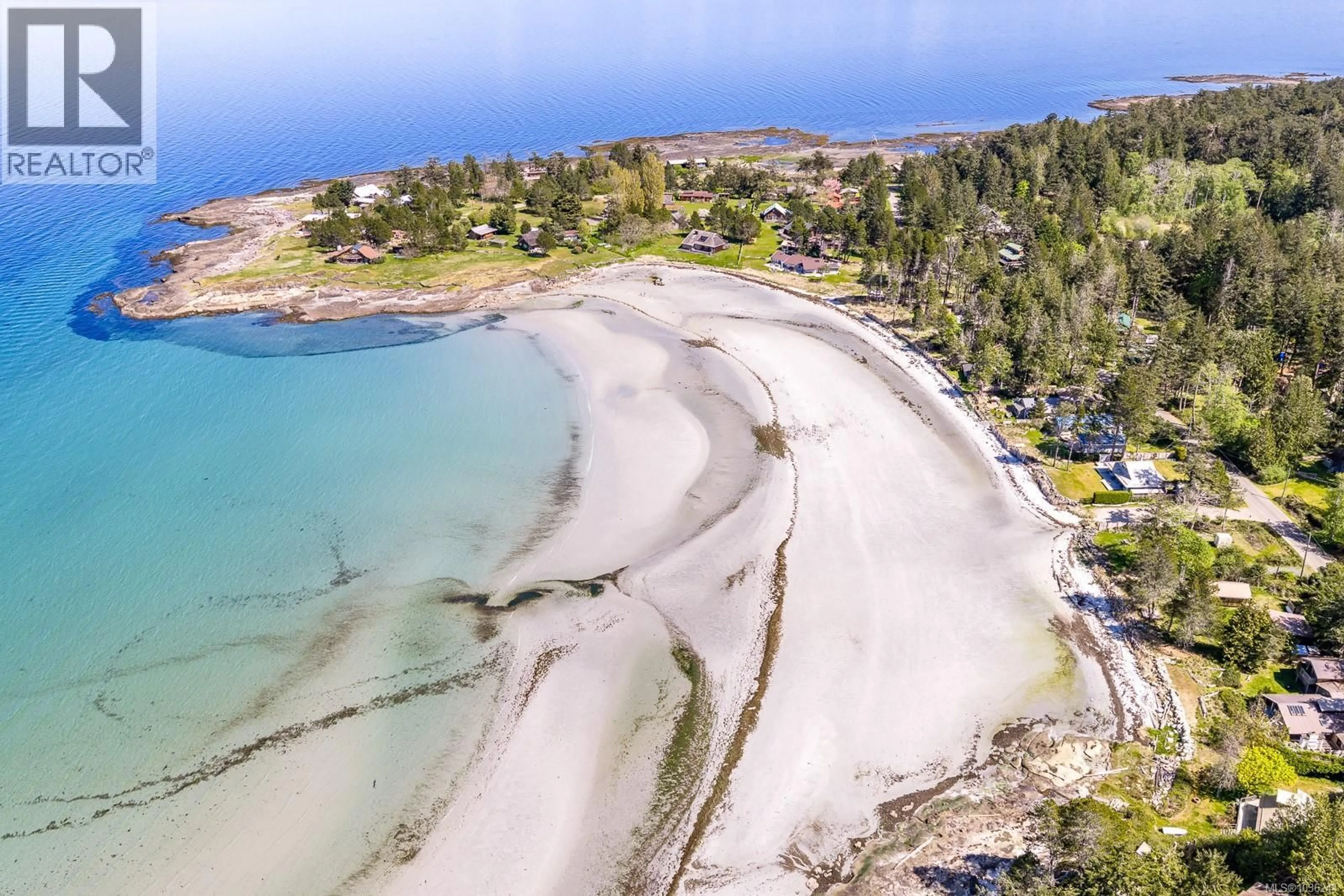 A pic from outside/outdoor area/front of a property/back of a property/a pic from drone, water/lake/river/ocean view for 7670 ANDERSON DRIVE, Hornby Island British Columbia V0R1Z0