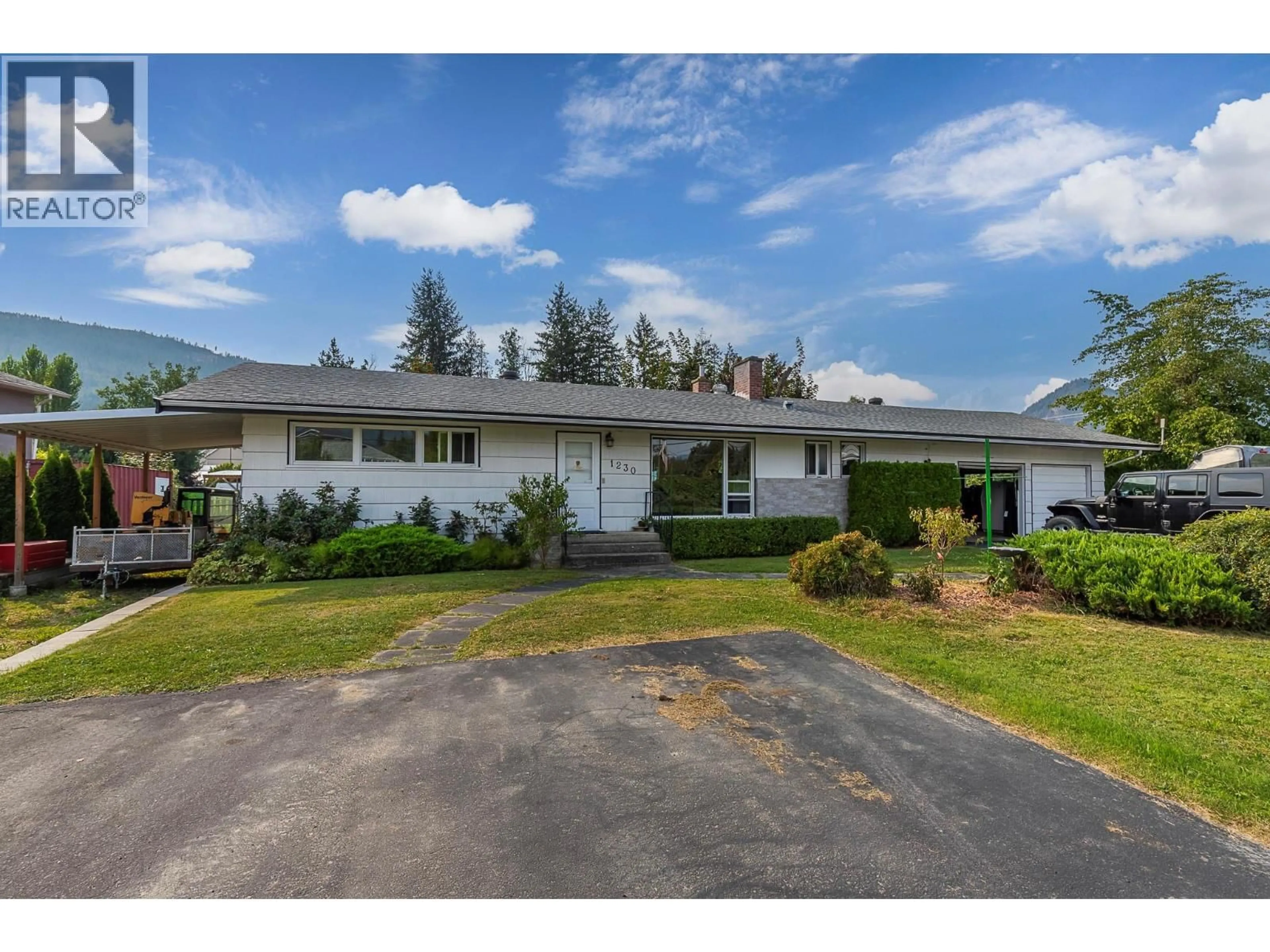 A pic from outside/outdoor area/front of a property/back of a property/a pic from drone, street for 1230 SHUSWAP AVENUE, Sicamous British Columbia V0E2V1