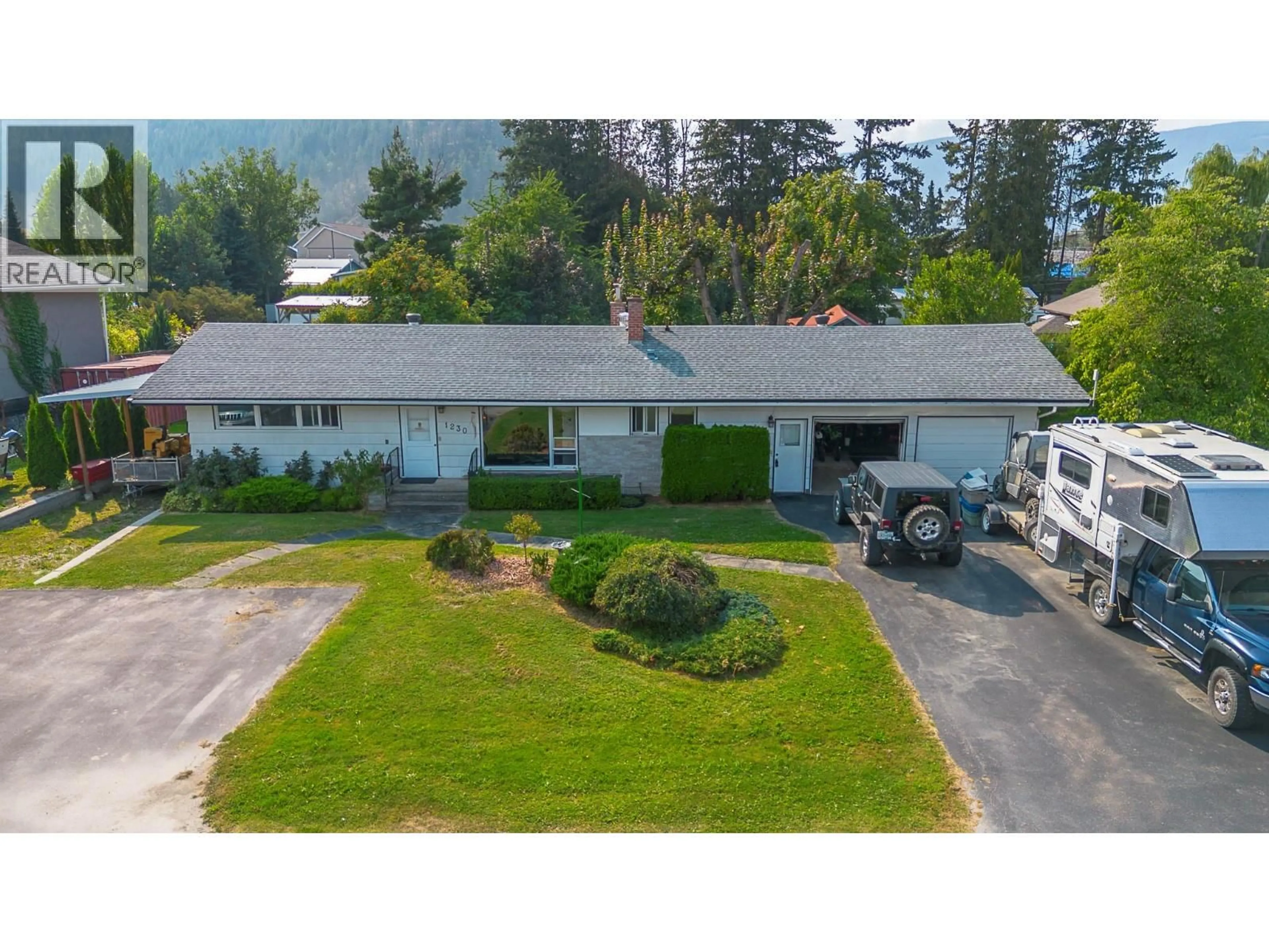 A pic from outside/outdoor area/front of a property/back of a property/a pic from drone, street for 1230 SHUSWAP AVENUE, Sicamous British Columbia V0E2V1
