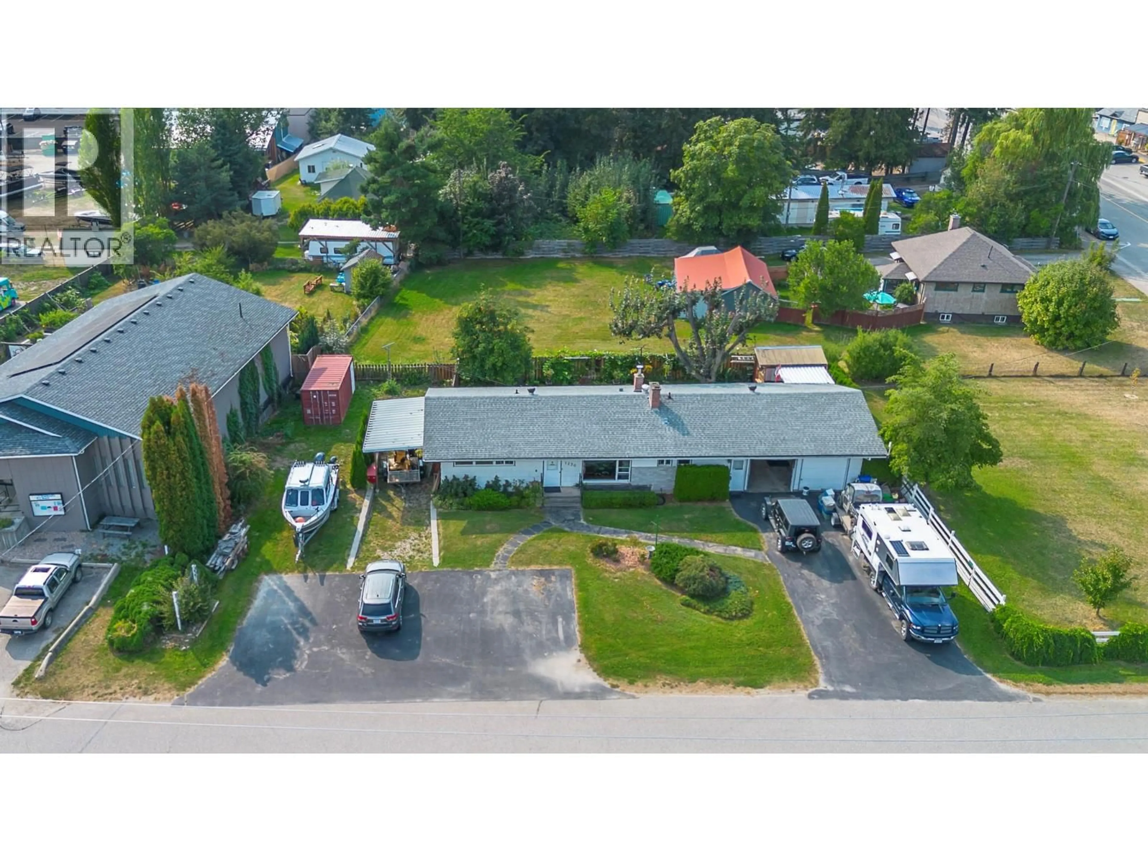 A pic from outside/outdoor area/front of a property/back of a property/a pic from drone, street for 1230 SHUSWAP AVENUE, Sicamous British Columbia V0E2V1