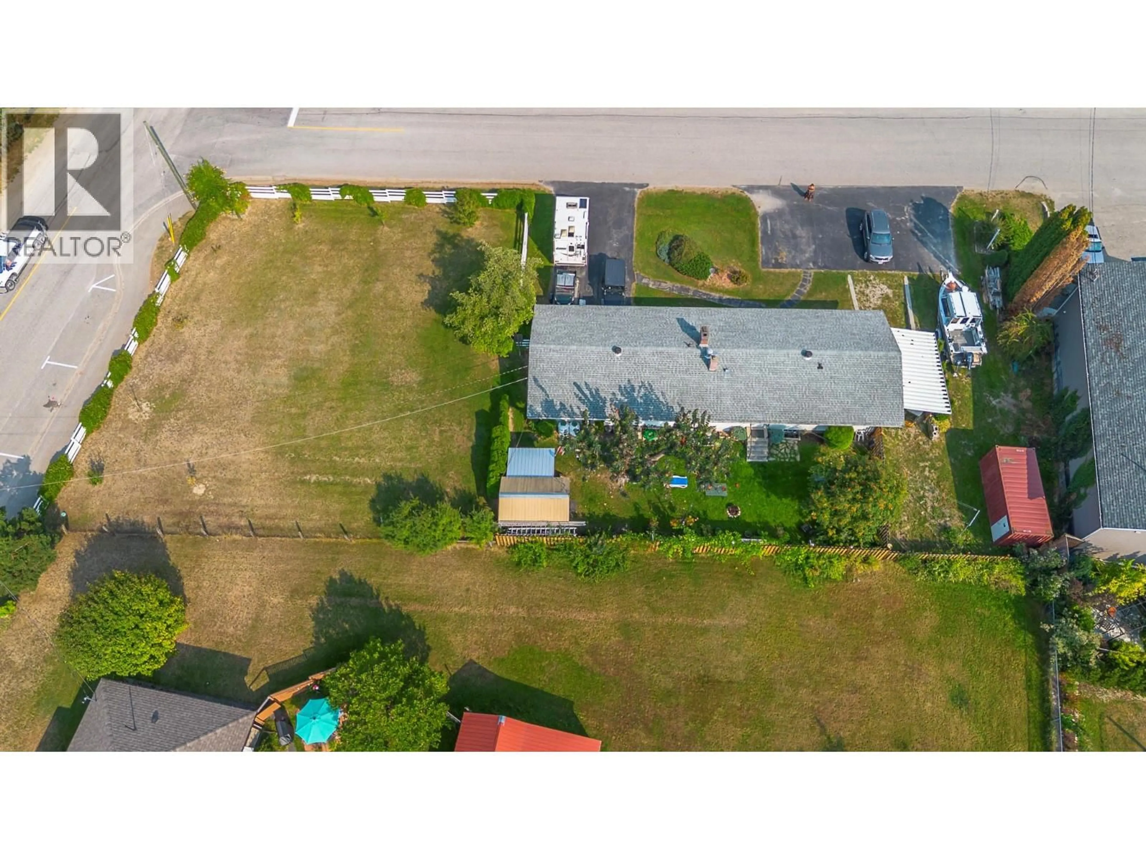 A pic from outside/outdoor area/front of a property/back of a property/a pic from drone, street for 1230 SHUSWAP AVENUE, Sicamous British Columbia V0E2V1