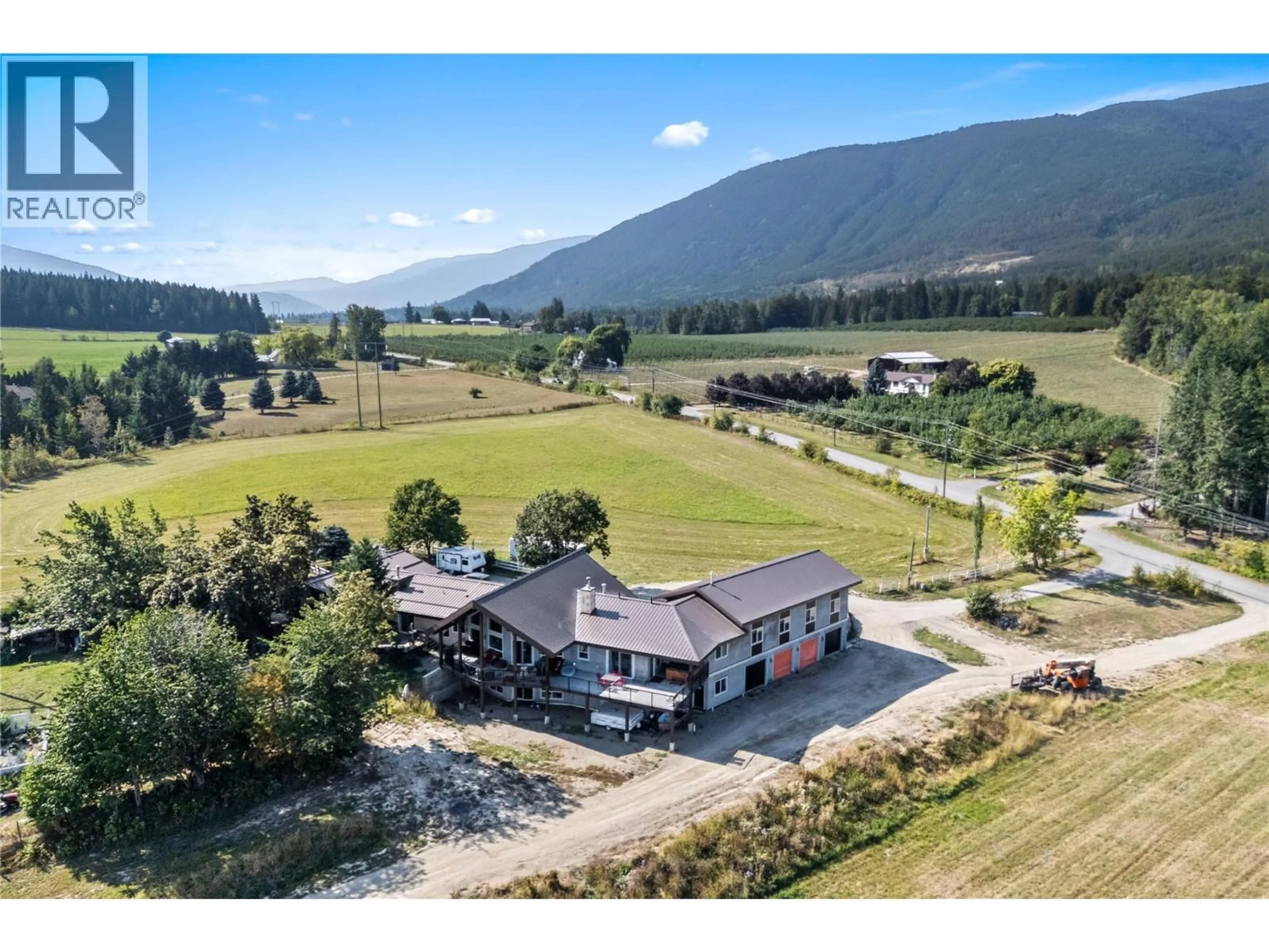A pic from outside/outdoor area/front of a property/back of a property/a pic from drone, mountain view for 3700 50 STREET, Salmon Arm British Columbia V1E3A9