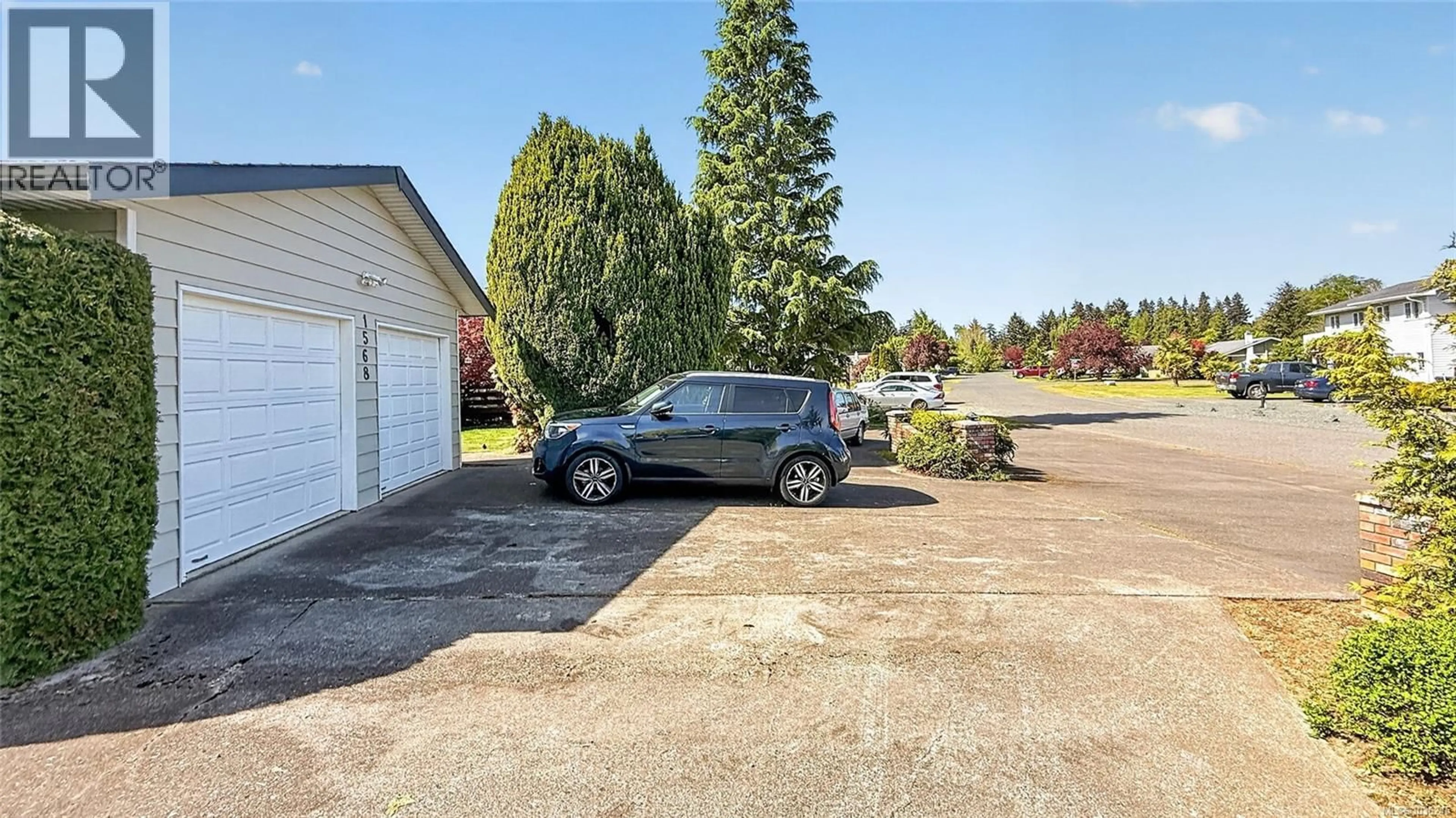A pic from outside/outdoor area/front of a property/back of a property/a pic from drone, street for 1568 MARINE CIRCLE, French Creek British Columbia V9P1Y6