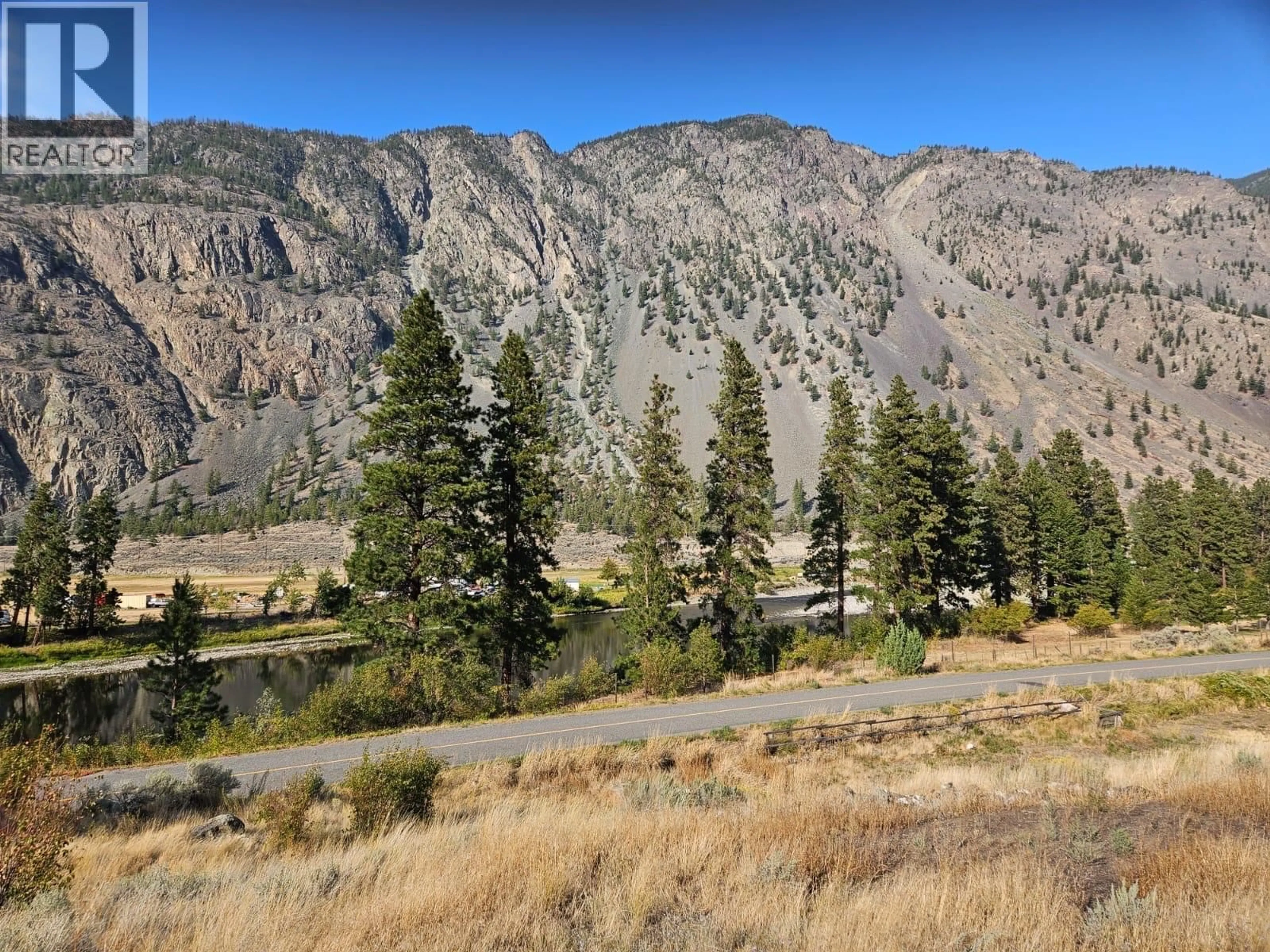 A pic from outside/outdoor area/front of a property/back of a property/a pic from drone, mountain view for 205 ASHNOLA ROAD, Keremeos British Columbia V0X1N1