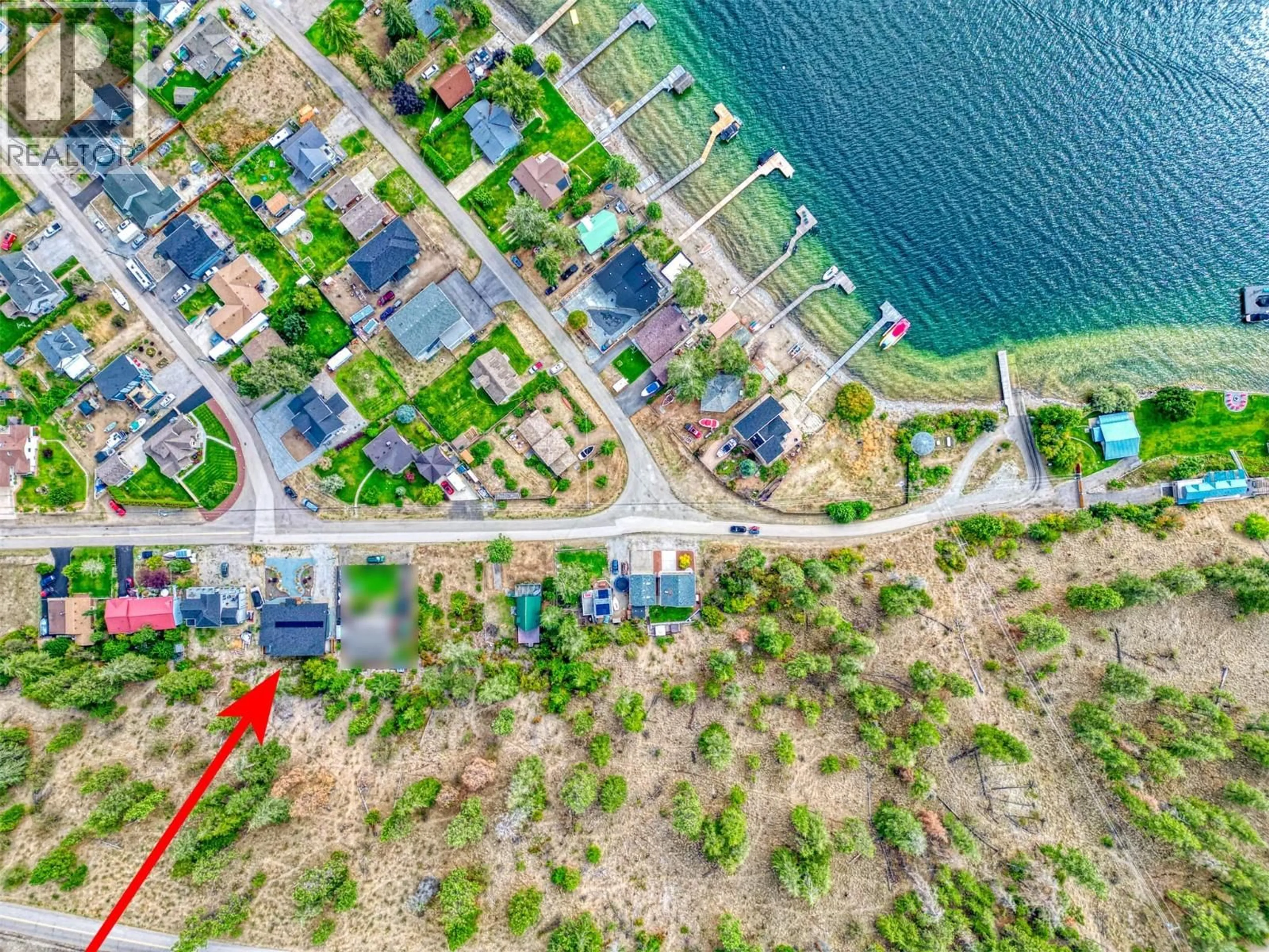 A pic from outside/outdoor area/front of a property/back of a property/a pic from drone, water/lake/river/ocean view for 7250 FINTRY DELTA ROAD, Fintry British Columbia V1Z3V1