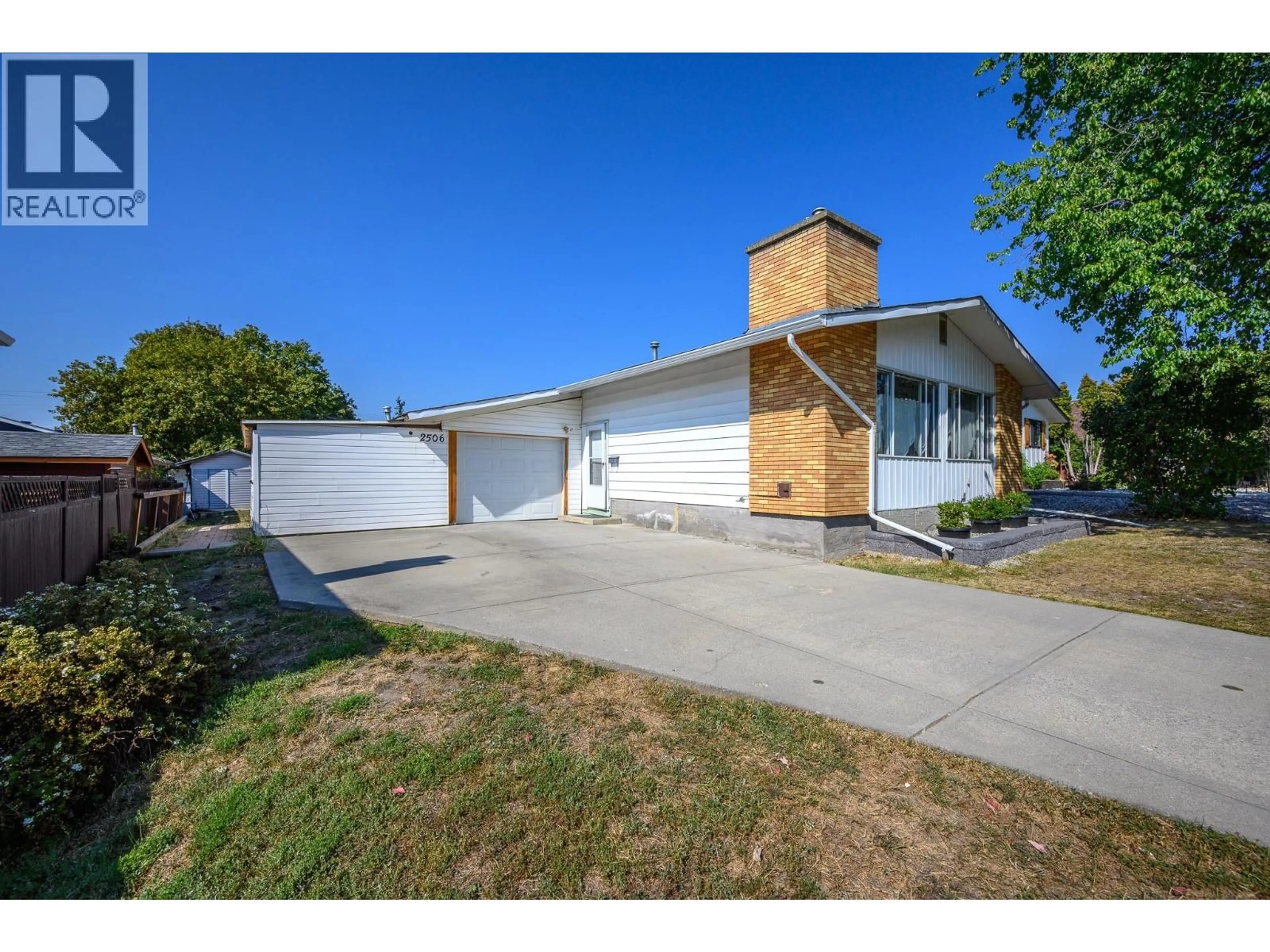 A pic from outside/outdoor area/front of a property/back of a property/a pic from drone, street for 2506 14 STREET, Vernon British Columbia V1T7H7