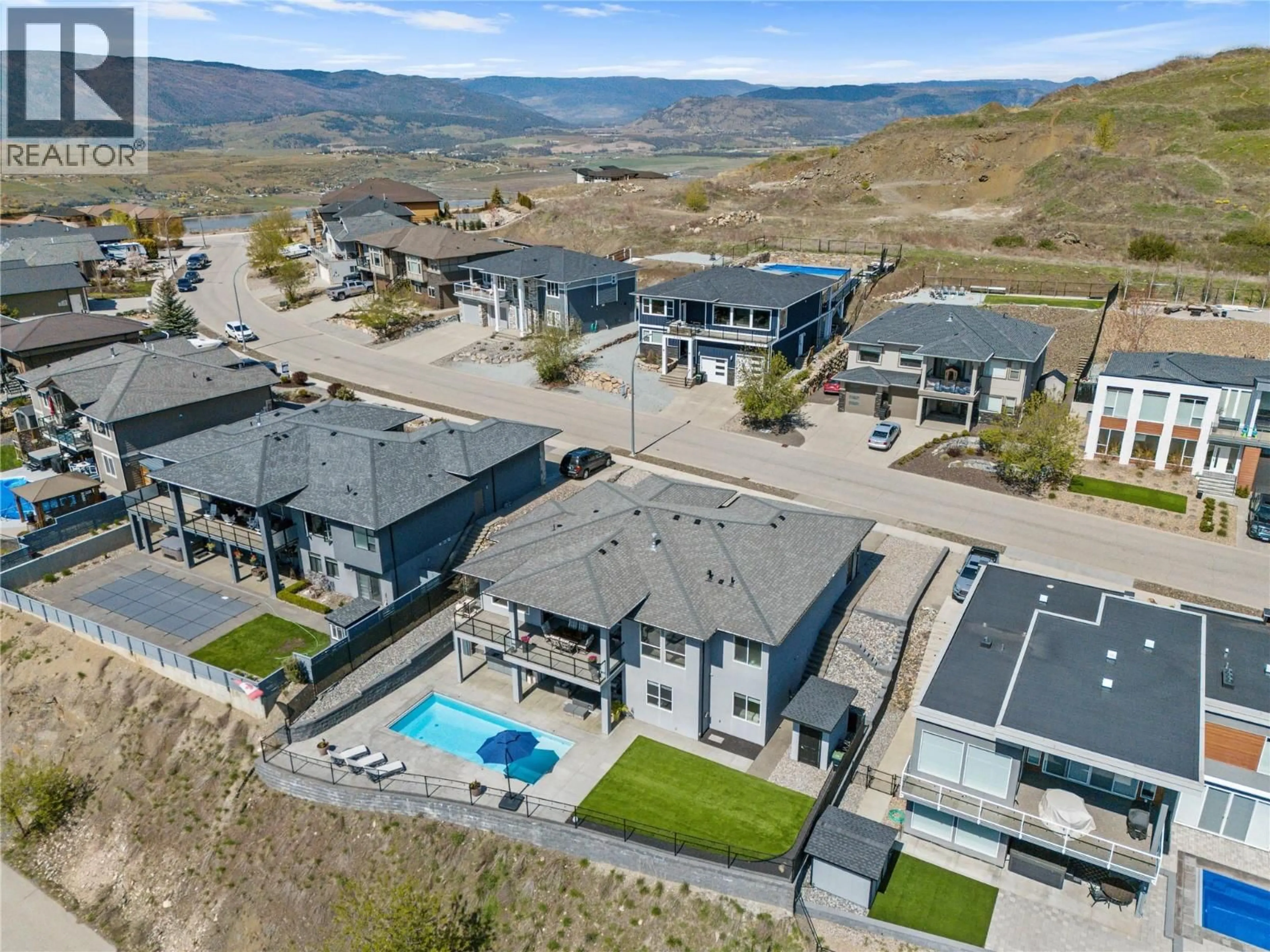 A pic from outside/outdoor area/front of a property/back of a property/a pic from drone, mountain view for 7185 APEX DRIVE, Vernon British Columbia V1T4E4