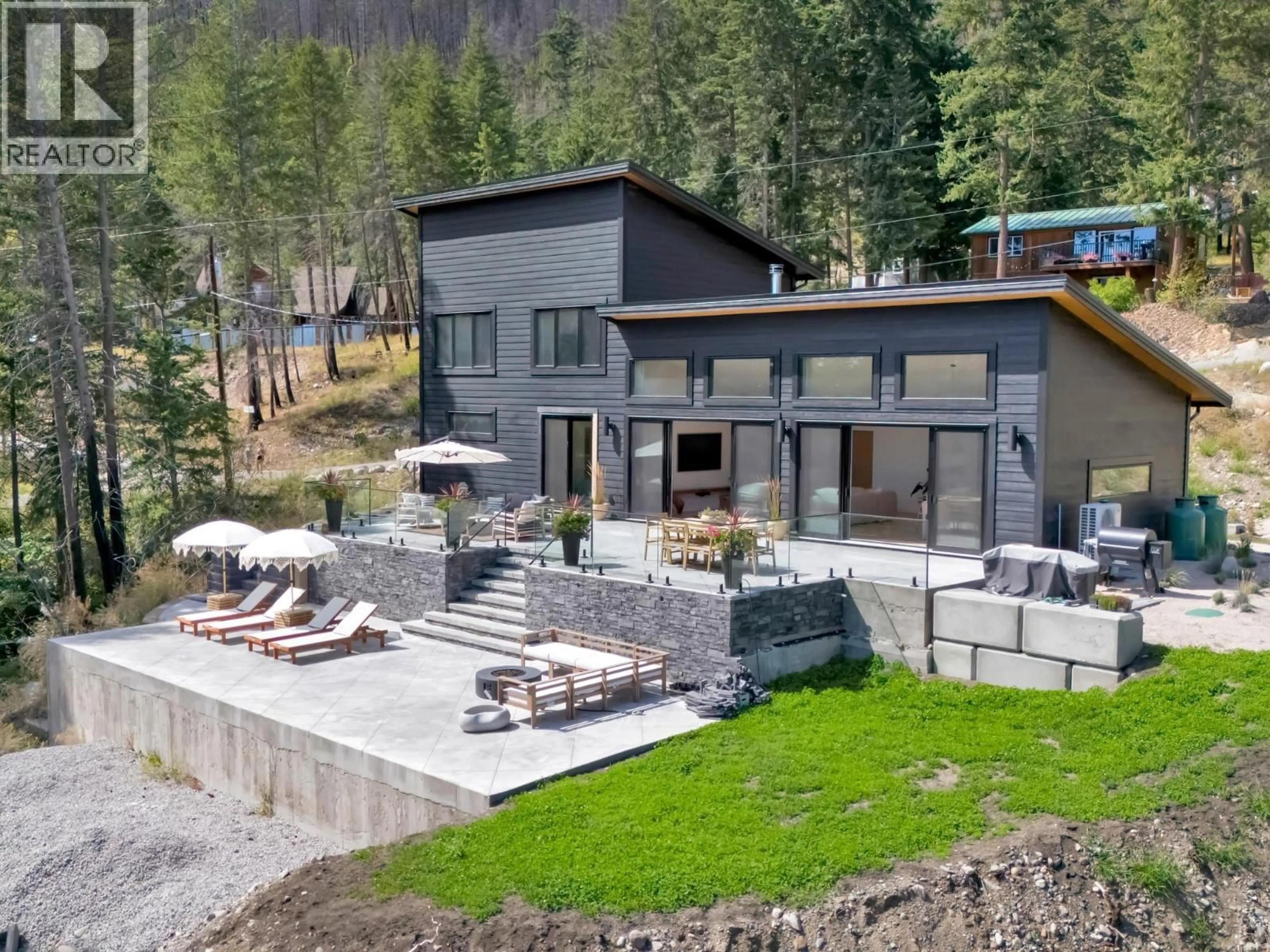 A pic from outside/outdoor area/front of a property/back of a property/a pic from drone, mountain view for 9485 HOUGHTON ROAD, Fintry British Columbia V1T7Z3