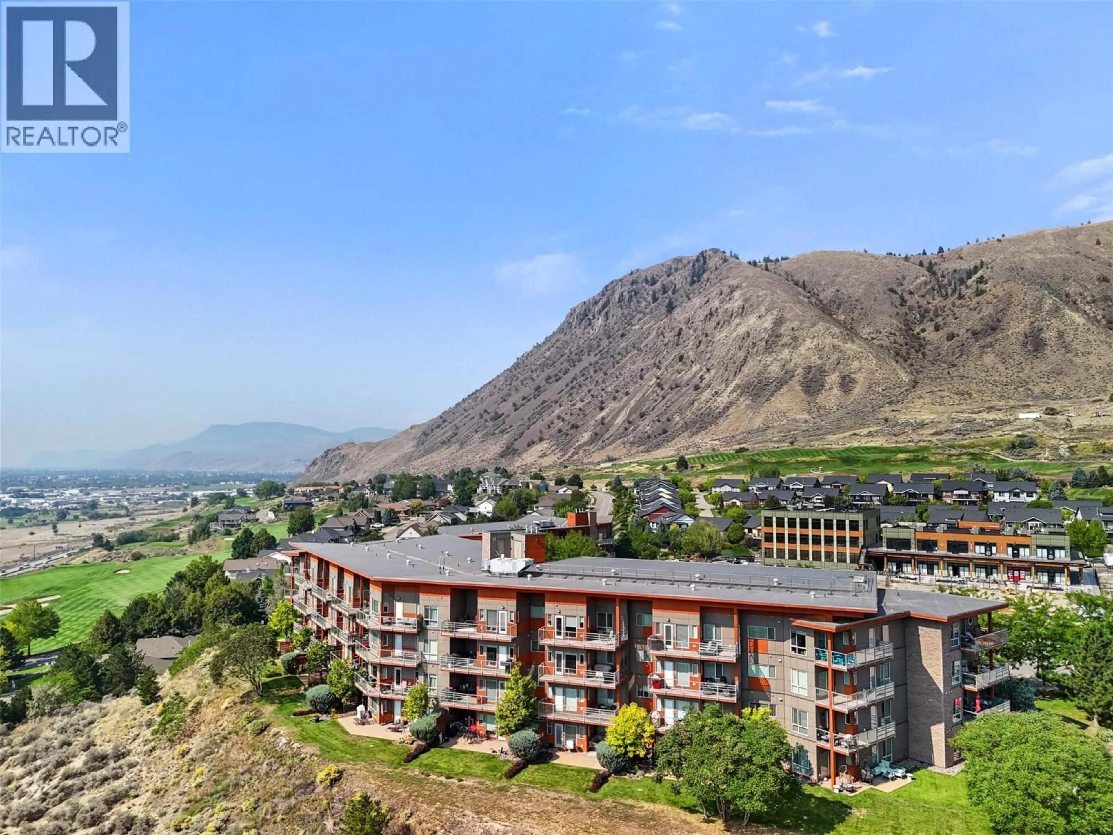 A pic from outside/outdoor area/front of a property/back of a property/a pic from drone, mountain view for 2411 - 1030 TALASA WAY, Kamloops British Columbia V2H0C3