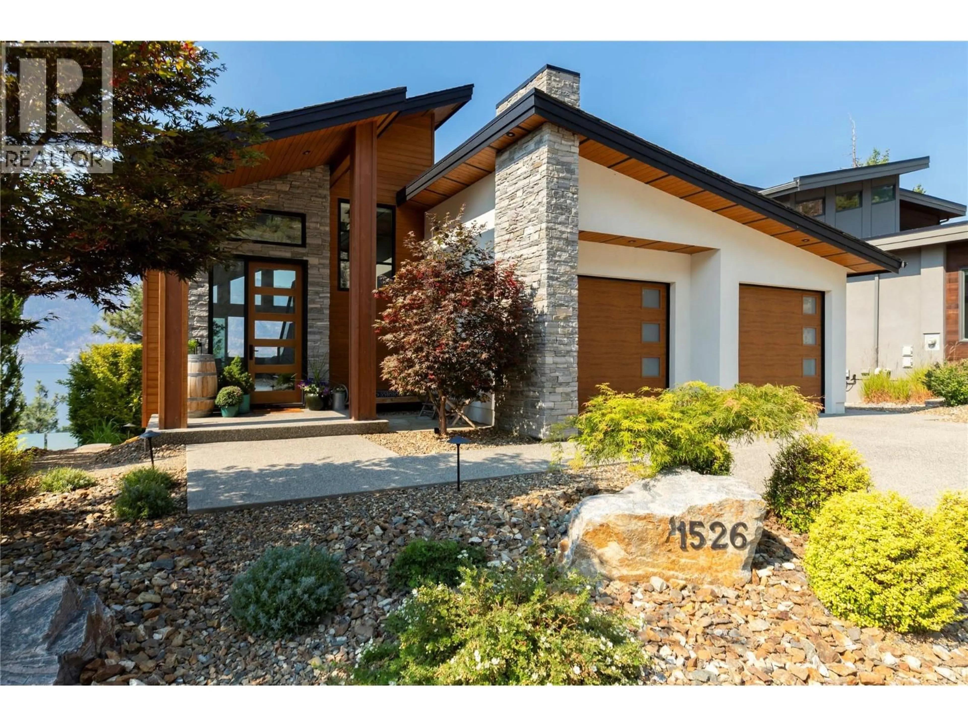 Home with brick exterior material, street for 1526 MARBLE LEDGE DRIVE, Lake Country British Columbia V4V2T4