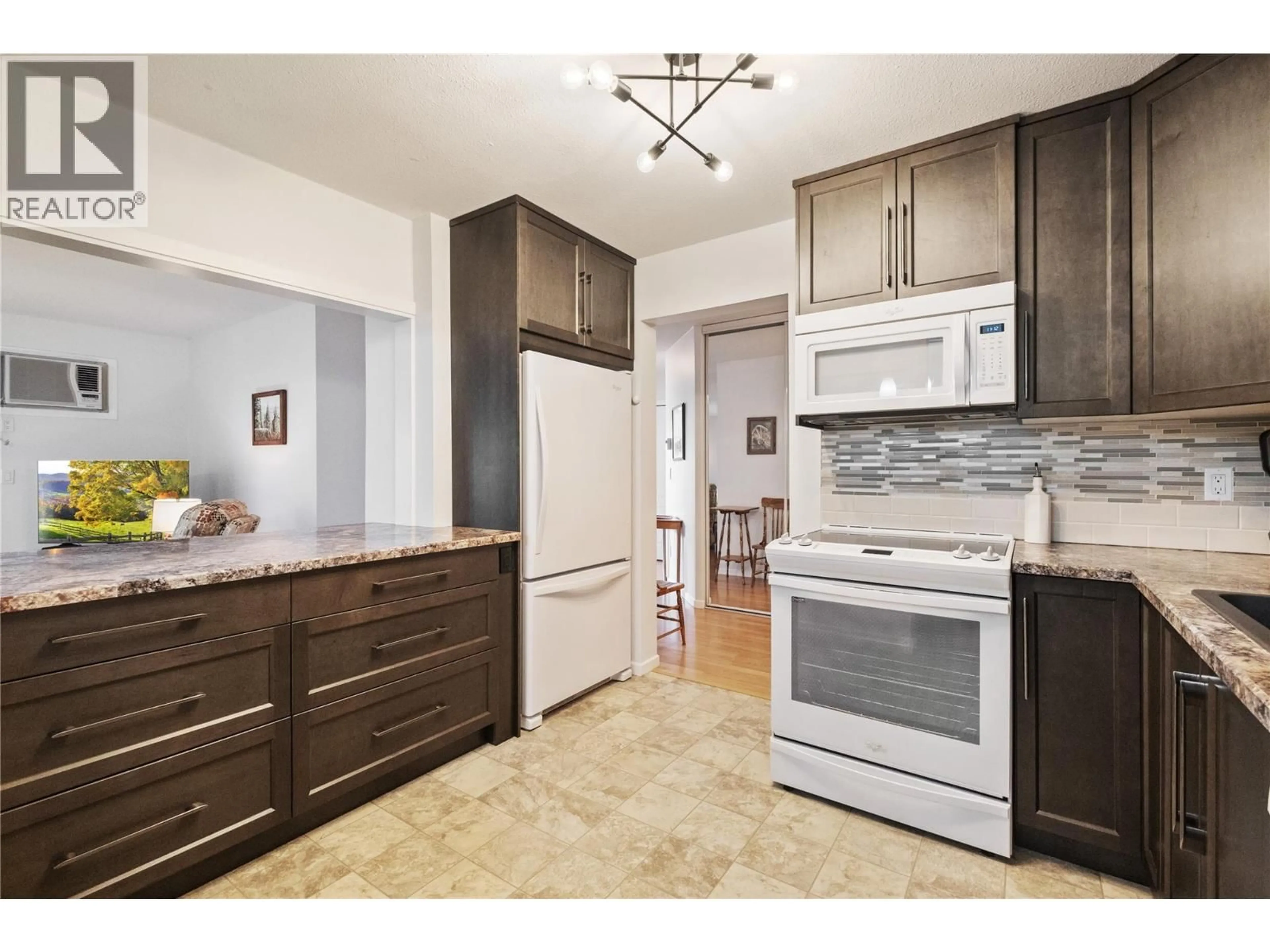 Open concept kitchen, unknown for 405 - 780 HOUGHTON ROAD, Kelowna British Columbia V1X5G7