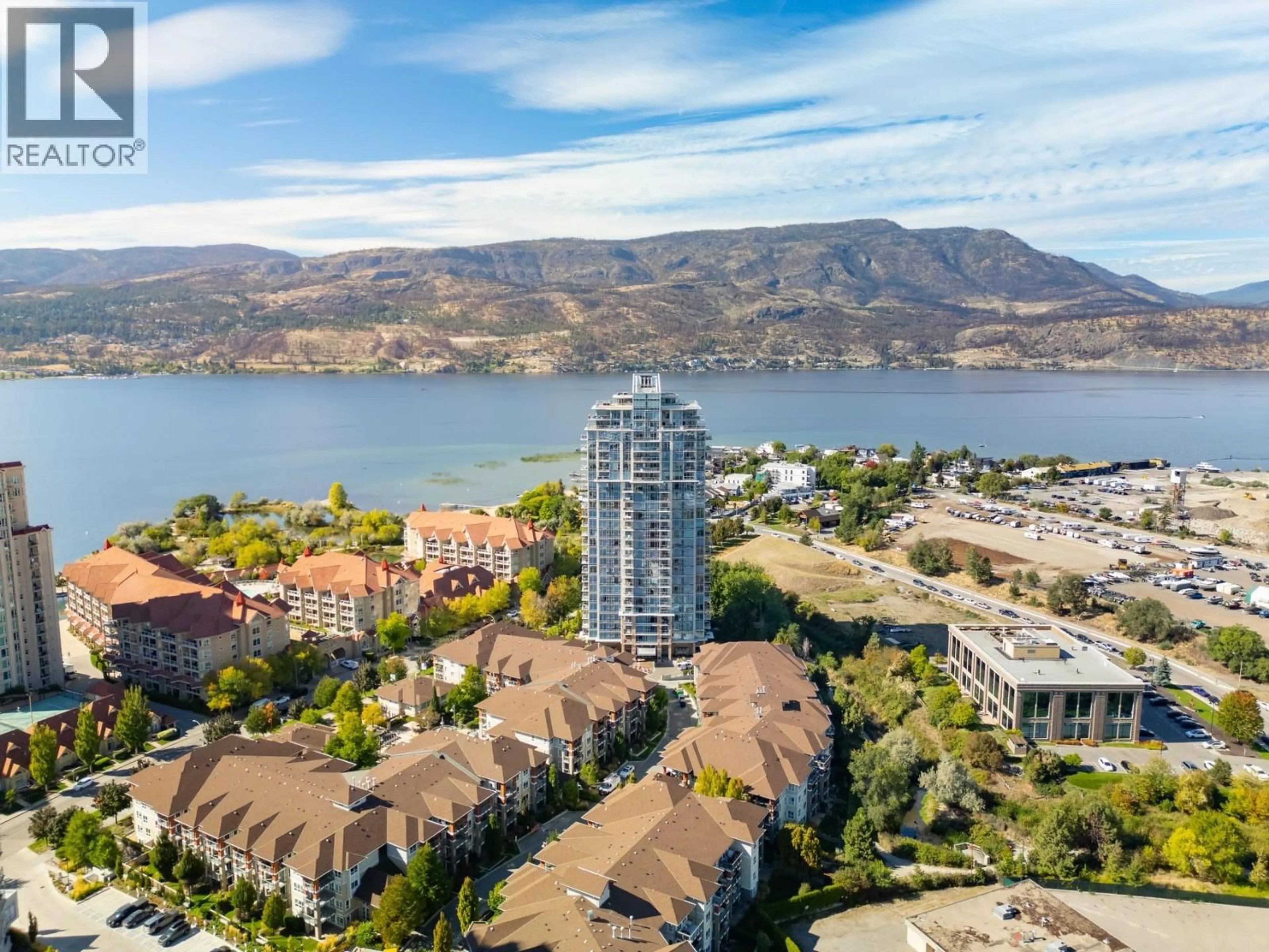A pic from outside/outdoor area/front of a property/back of a property/a pic from drone, water/lake/river/ocean view for PH1 - 1075 SUNSET DRIVE, Kelowna British Columbia V1Y9Y9