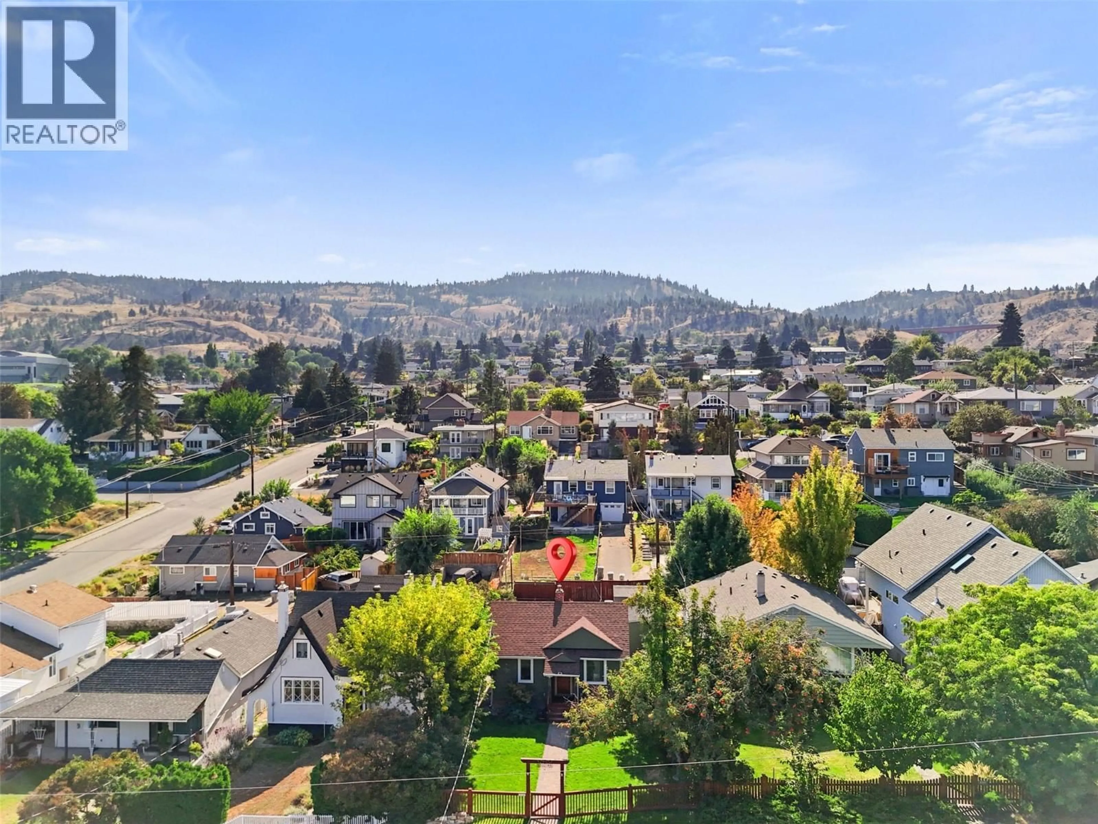A pic from outside/outdoor area/front of a property/back of a property/a pic from drone, mountain view for 669 PINE STREET, Kamloops British Columbia V2C2Z6