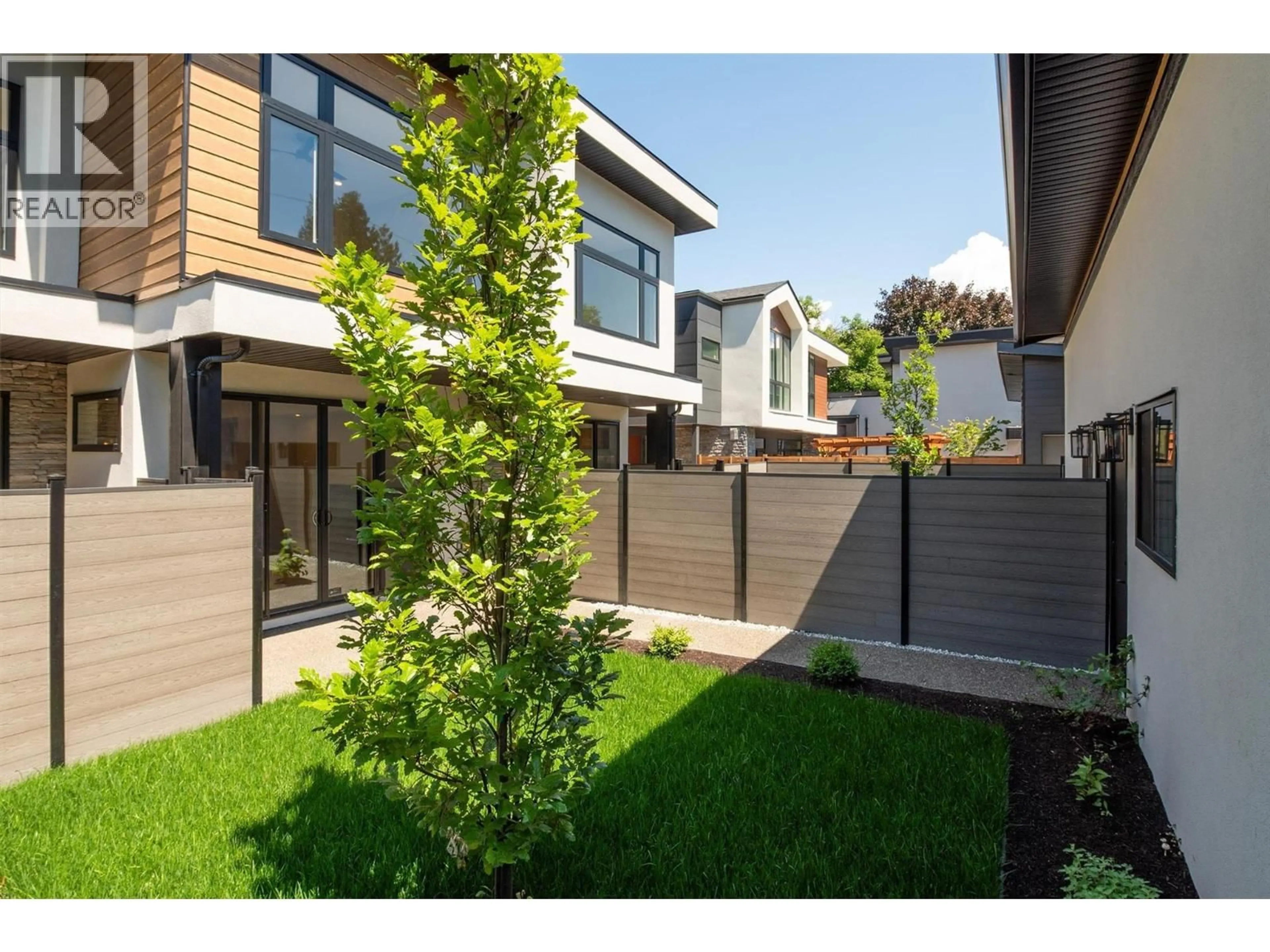 Home with brick exterior material, street for 3 - 839 LAWSON AVENUE, Kelowna British Columbia V1Y6S9