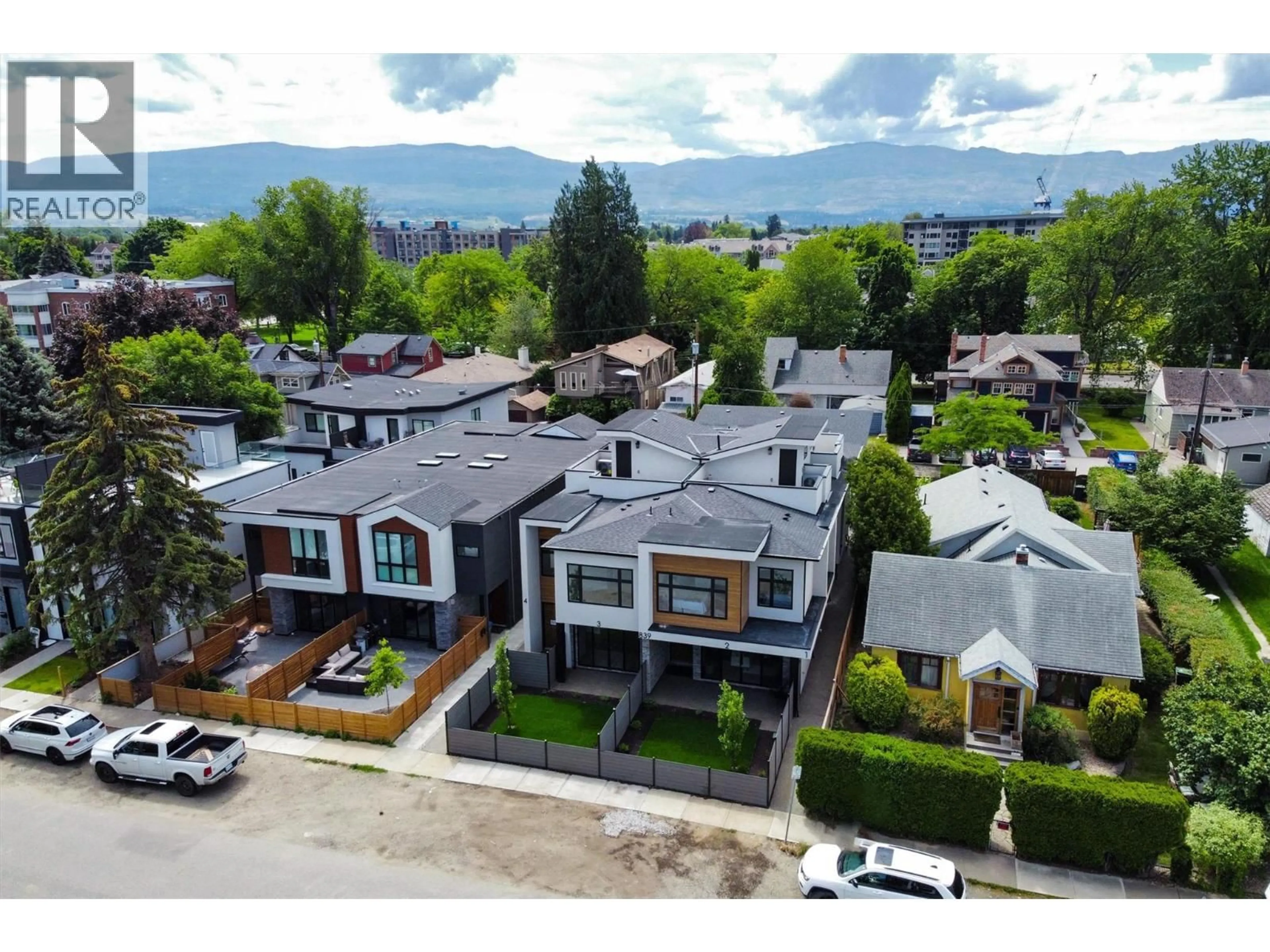 A pic from outside/outdoor area/front of a property/back of a property/a pic from drone, mountain view for 3 - 839 LAWSON AVENUE, Kelowna British Columbia V1Y6S9