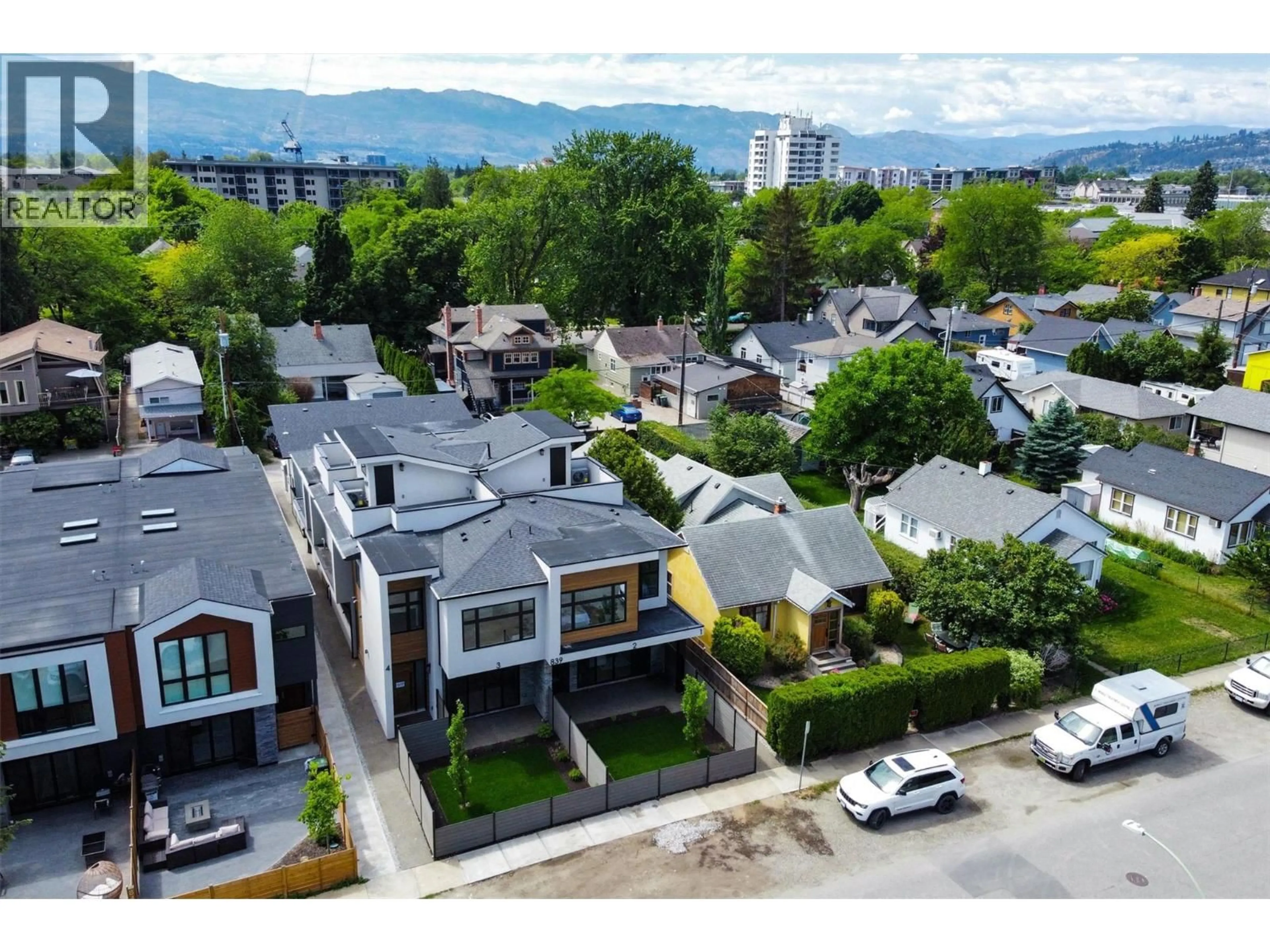 A pic from outside/outdoor area/front of a property/back of a property/a pic from drone, mountain view for 3 - 839 LAWSON AVENUE, Kelowna British Columbia V1Y6S9