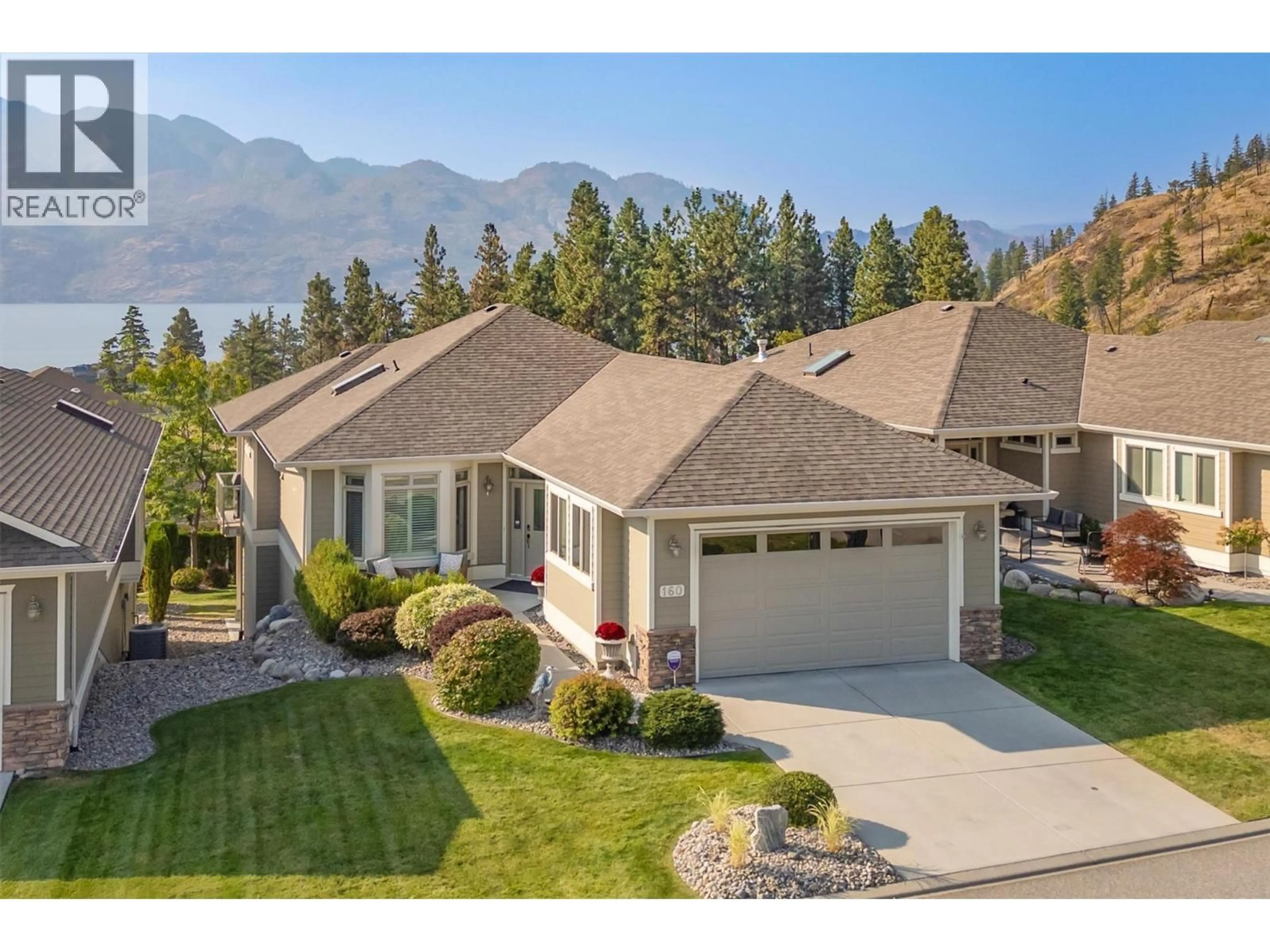 A pic from outside/outdoor area/front of a property/back of a property/a pic from drone, mountain view for 160 - 4035 GELLATLY ROAD, West Kelowna British Columbia V4T1R7