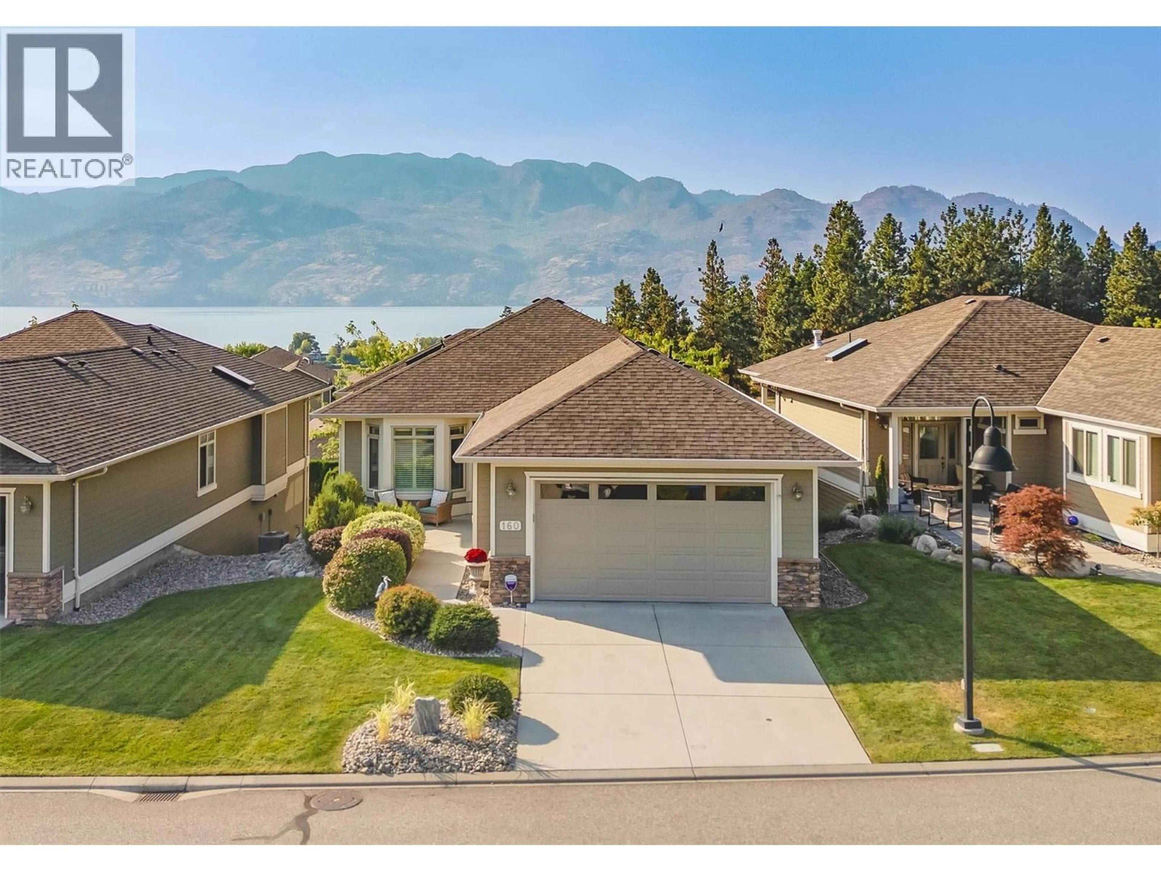A pic from outside/outdoor area/front of a property/back of a property/a pic from drone, mountain view for 160 - 4035 GELLATLY ROAD, West Kelowna British Columbia V4T1R7