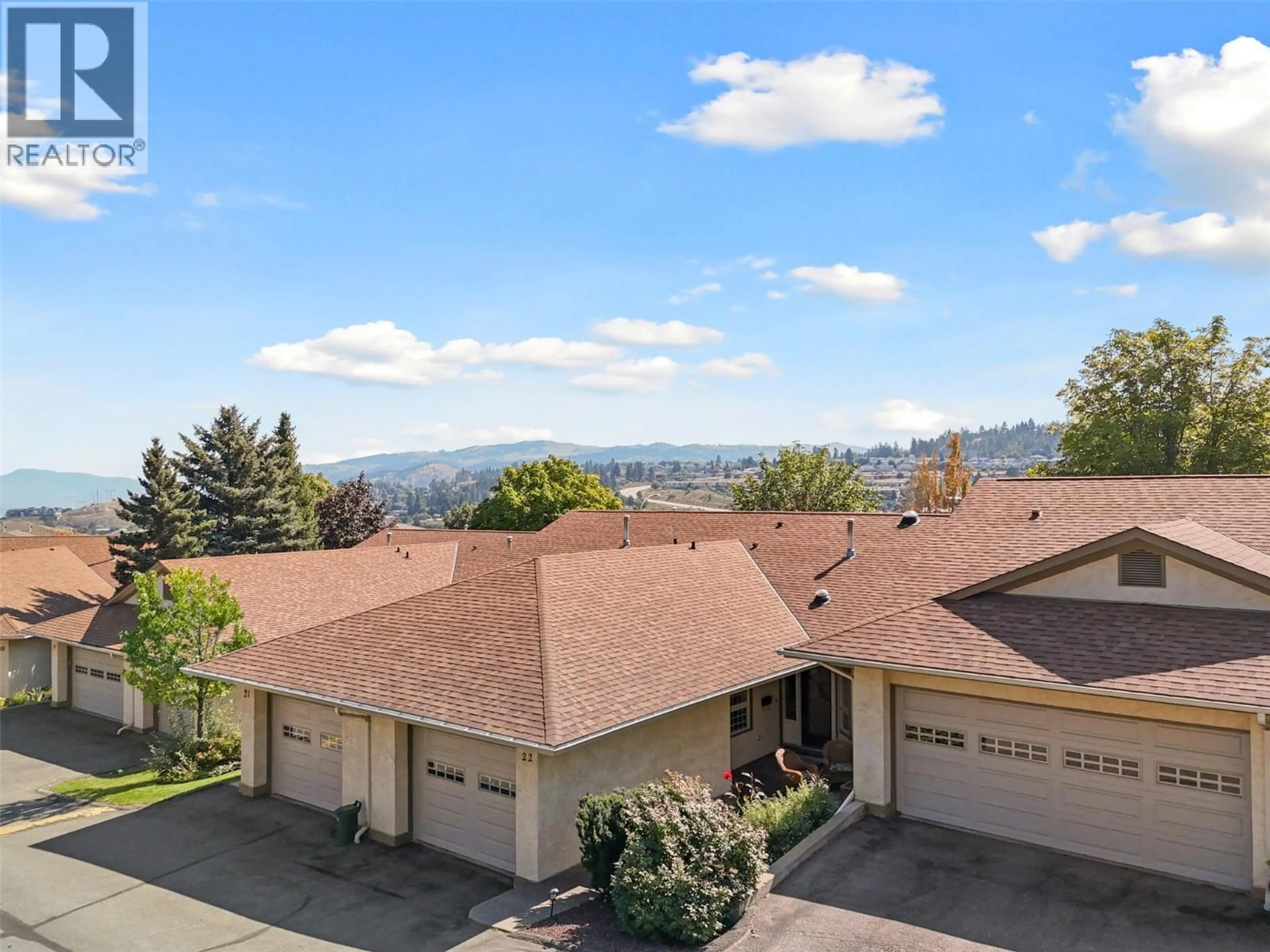 A pic from outside/outdoor area/front of a property/back of a property/a pic from drone, mountain view for 22 - 1750 PACIFIC WAY, Kamloops British Columbia V2E2K8