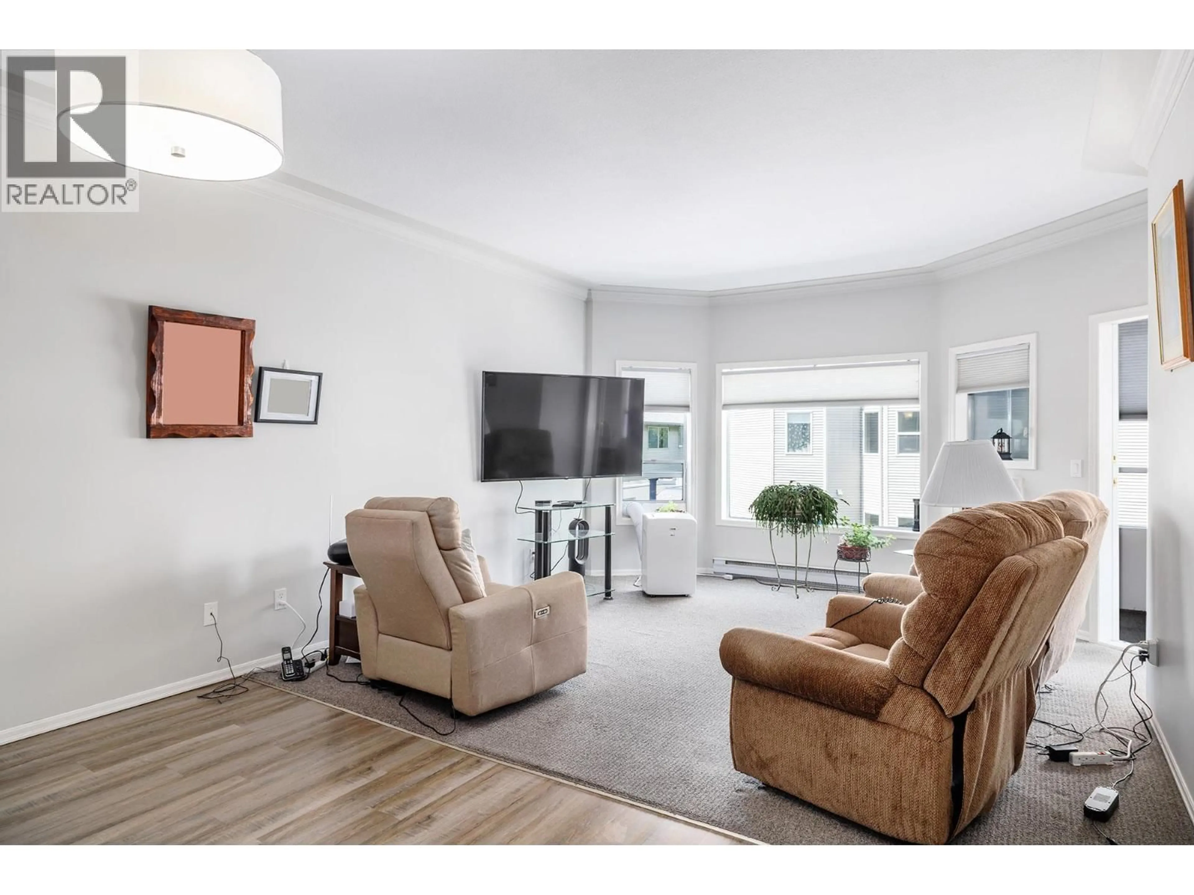 Living room with furniture, unknown for 227 - 877 KLO ROAD, Kelowna British Columbia V1Y9R1
