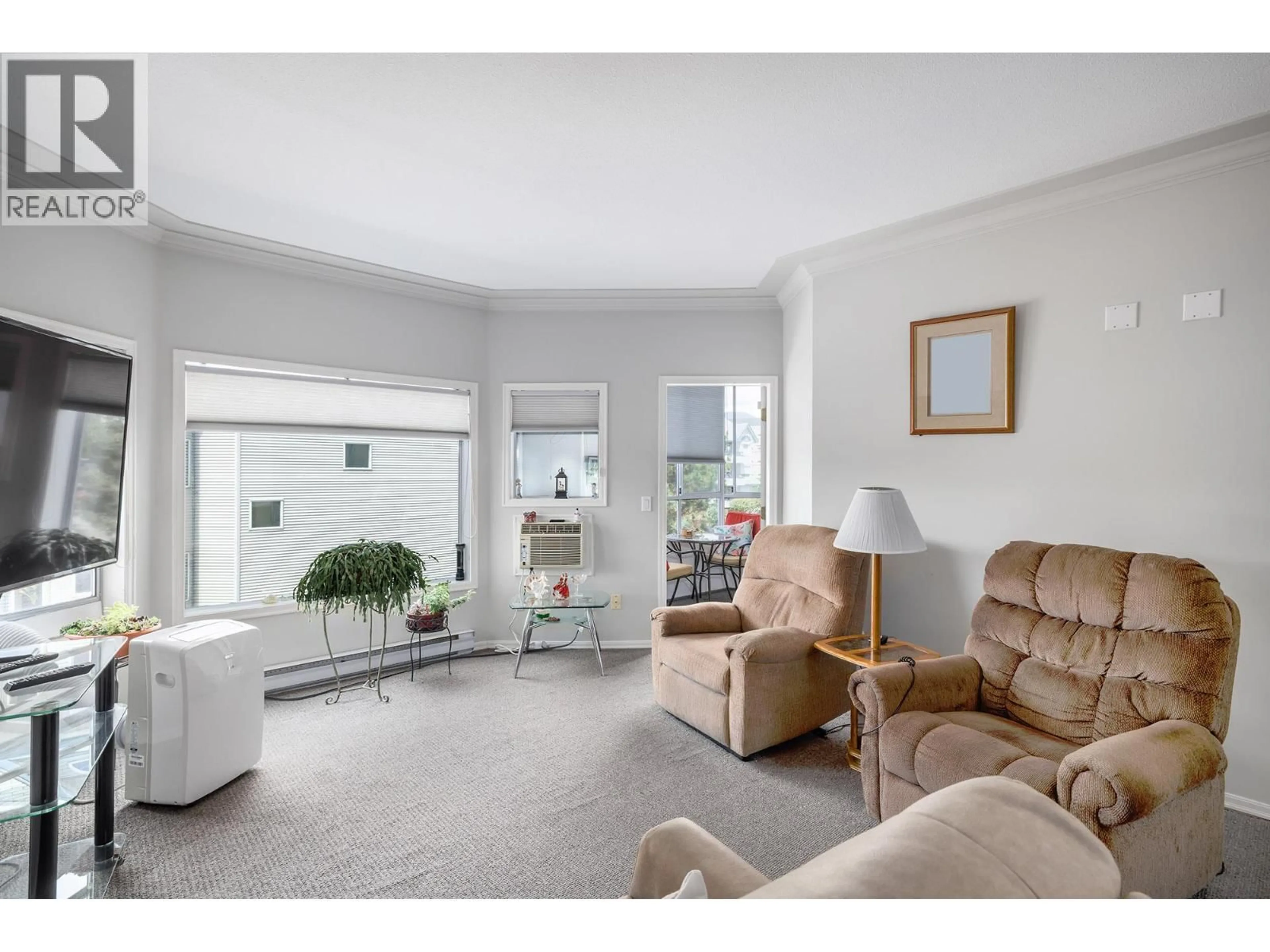 Living room with furniture, unknown for 227 - 877 KLO ROAD, Kelowna British Columbia V1Y9R1