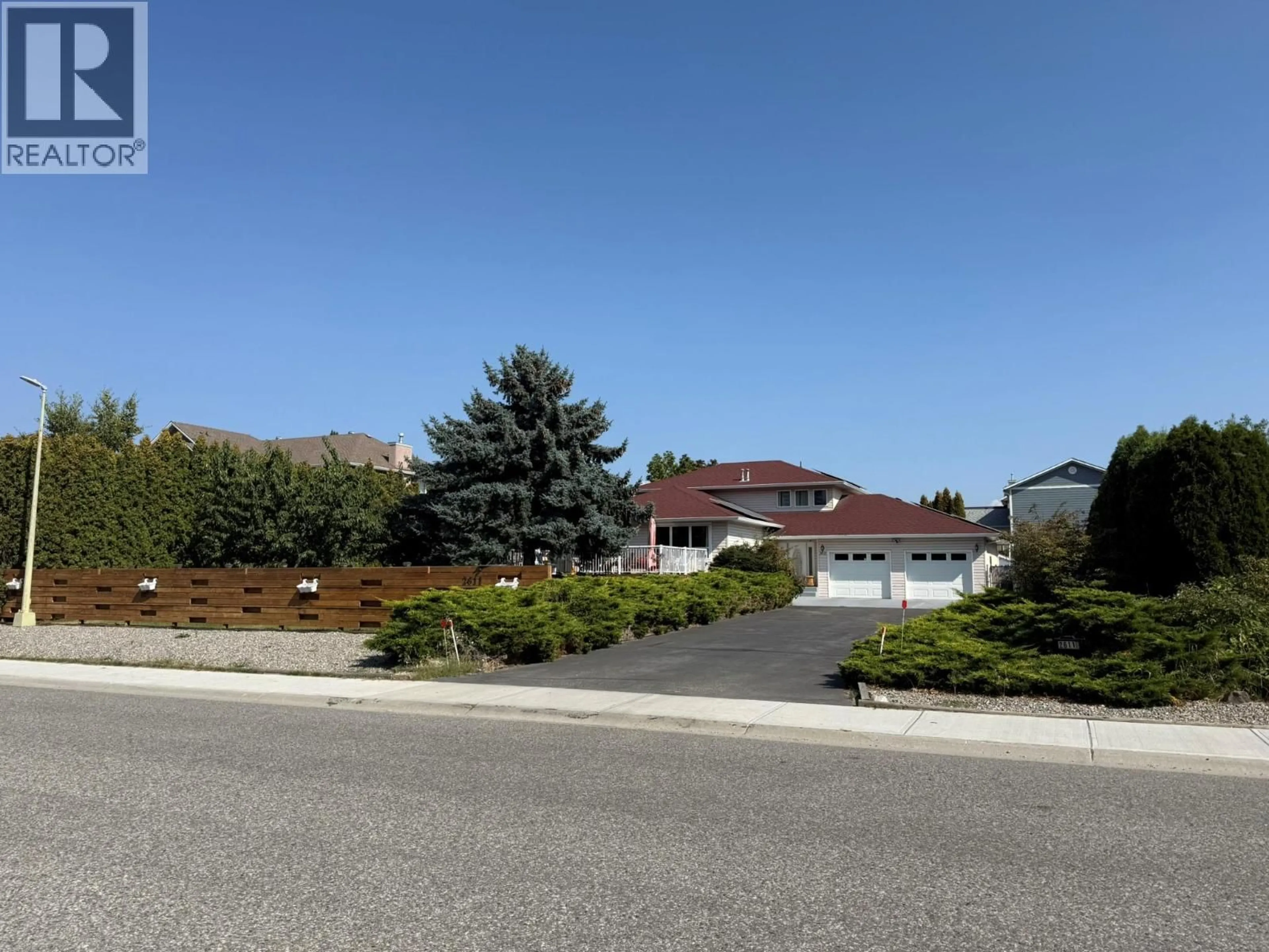 A pic from outside/outdoor area/front of a property/back of a property/a pic from drone, street for 2611 GUIDI ROAD, West Kelowna British Columbia V1Z3J9