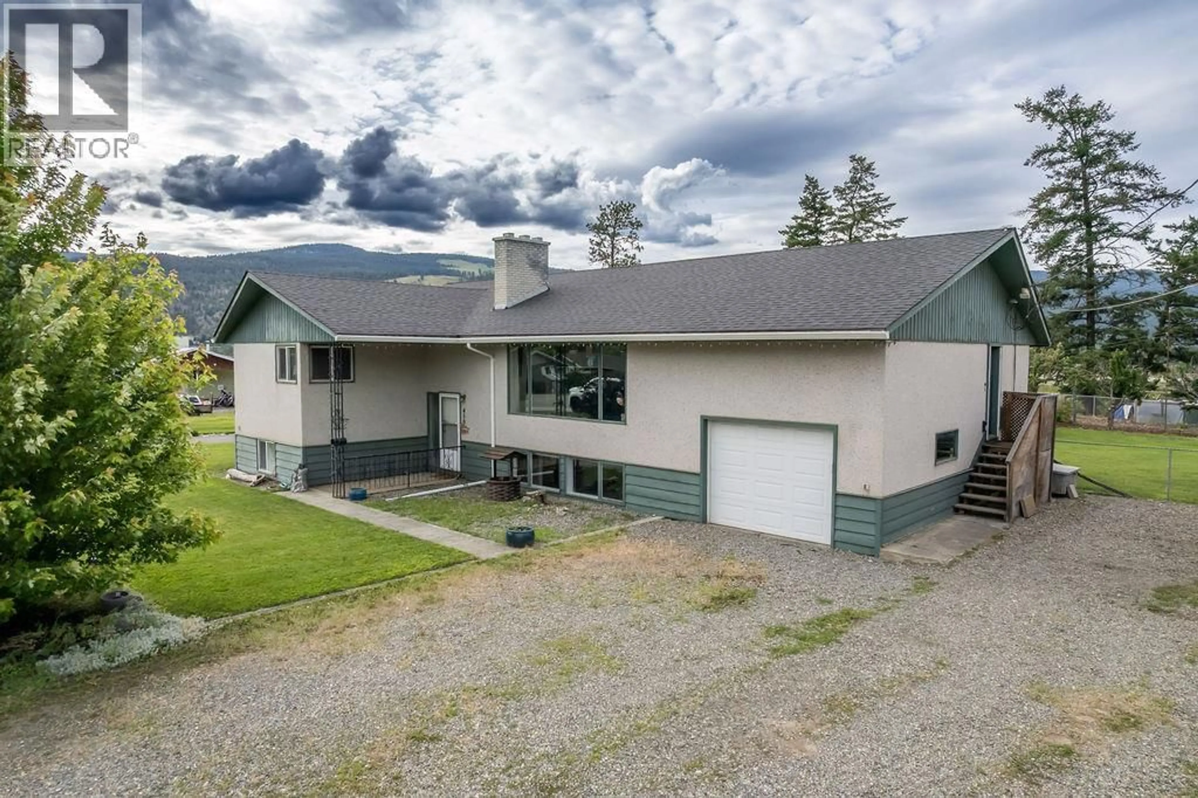 A pic from outside/outdoor area/front of a property/back of a property/a pic from drone, mountain view for 450 STATION ROAD, Kamloops British Columbia V2H0B5