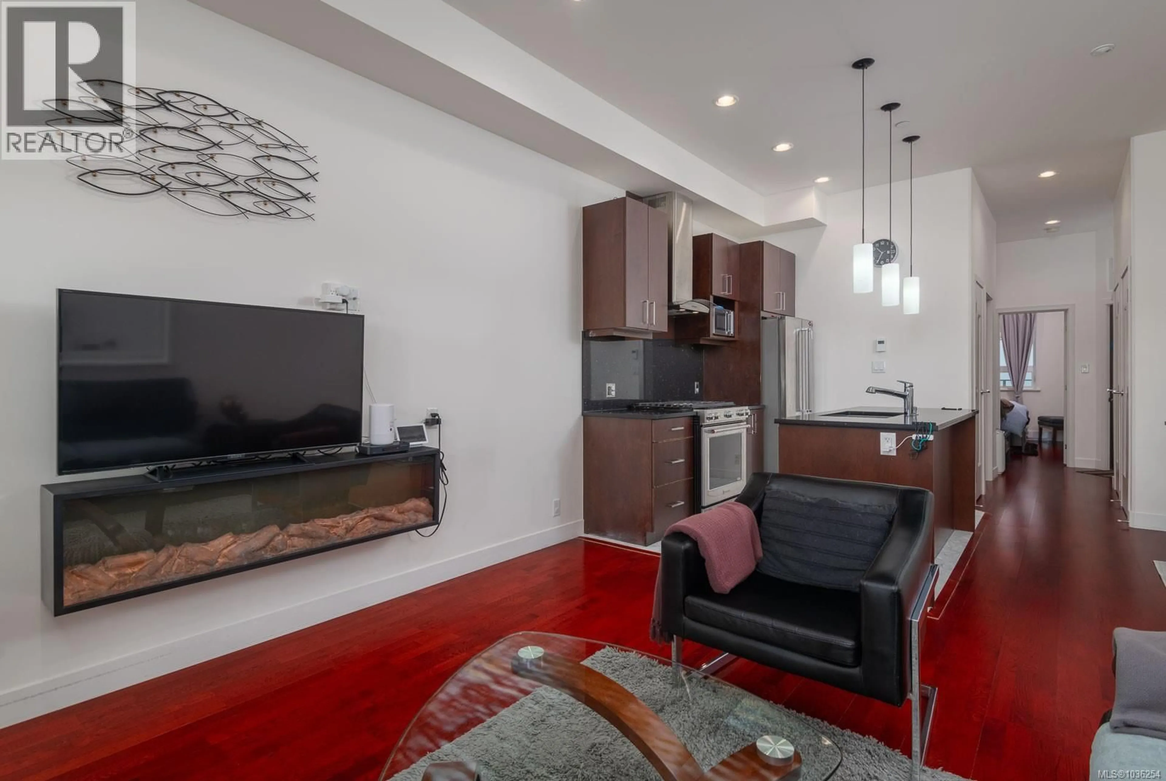 Living room with furniture, unknown for 303 - 10 CHAPEL STREET, Nanaimo British Columbia V9R5H2