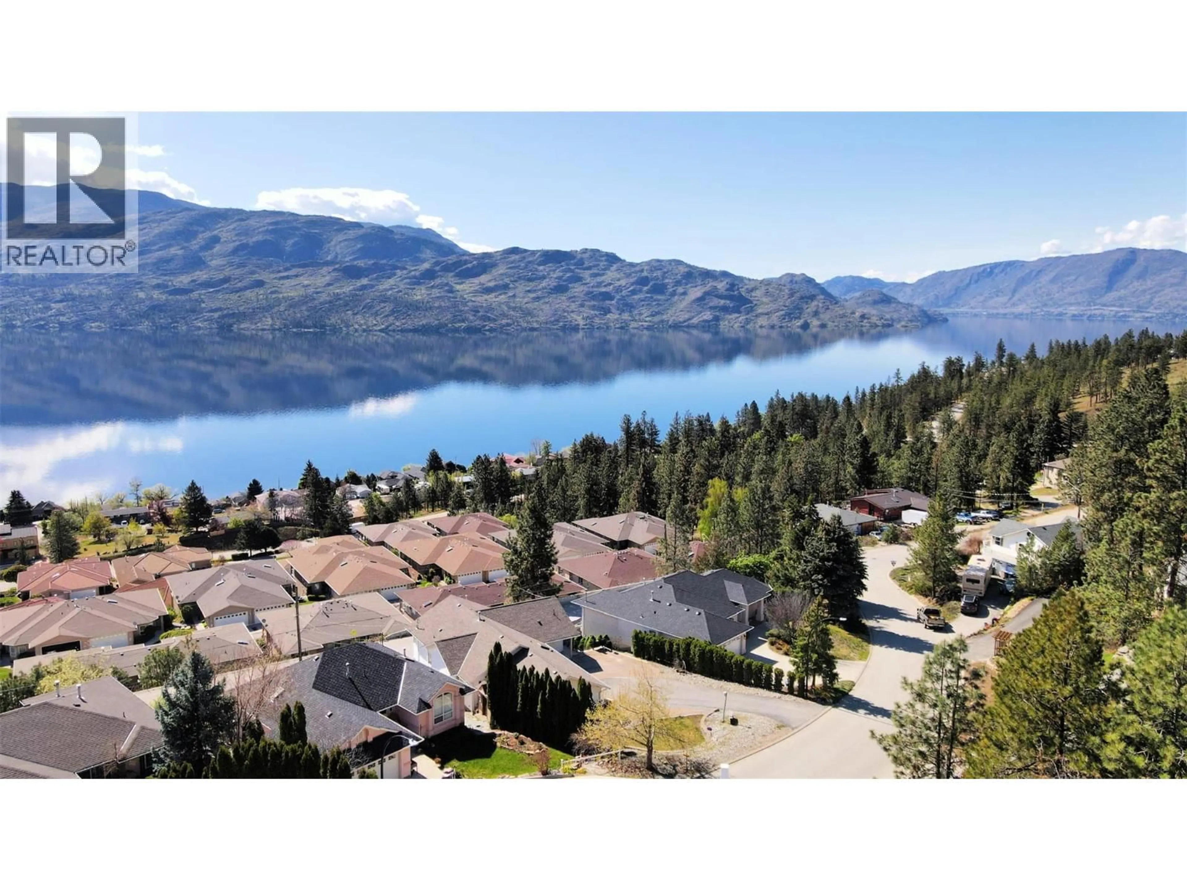 A pic from outside/outdoor area/front of a property/back of a property/a pic from drone, water/lake/river/ocean view for 5227 TREPANIER BENCH ROAD, Peachland British Columbia V0H1X2