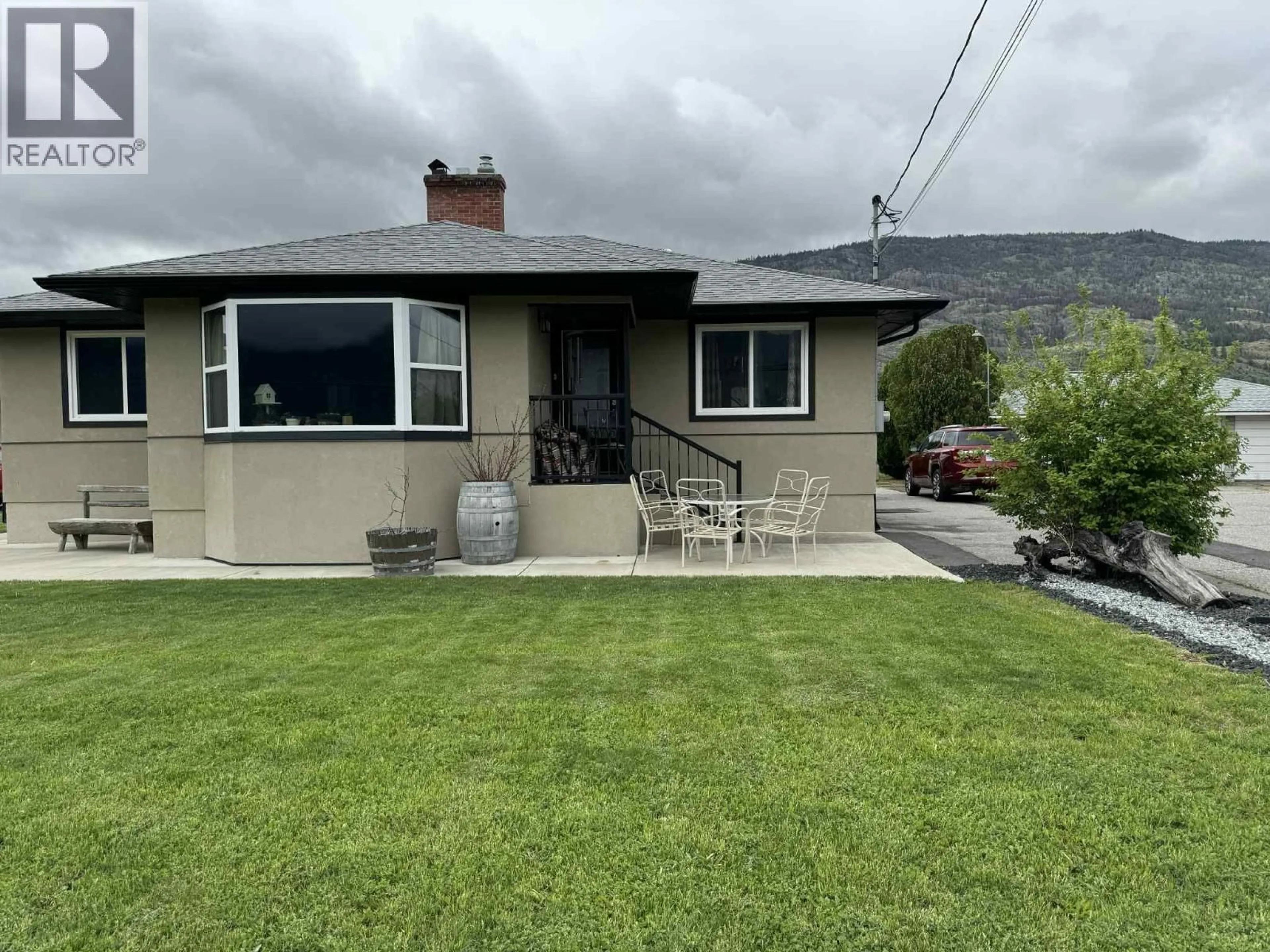 A pic from outside/outdoor area/front of a property/back of a property/a pic from drone, street for 9806 HIGHWAY 97 OTHER, Osoyoos British Columbia V0H1V2