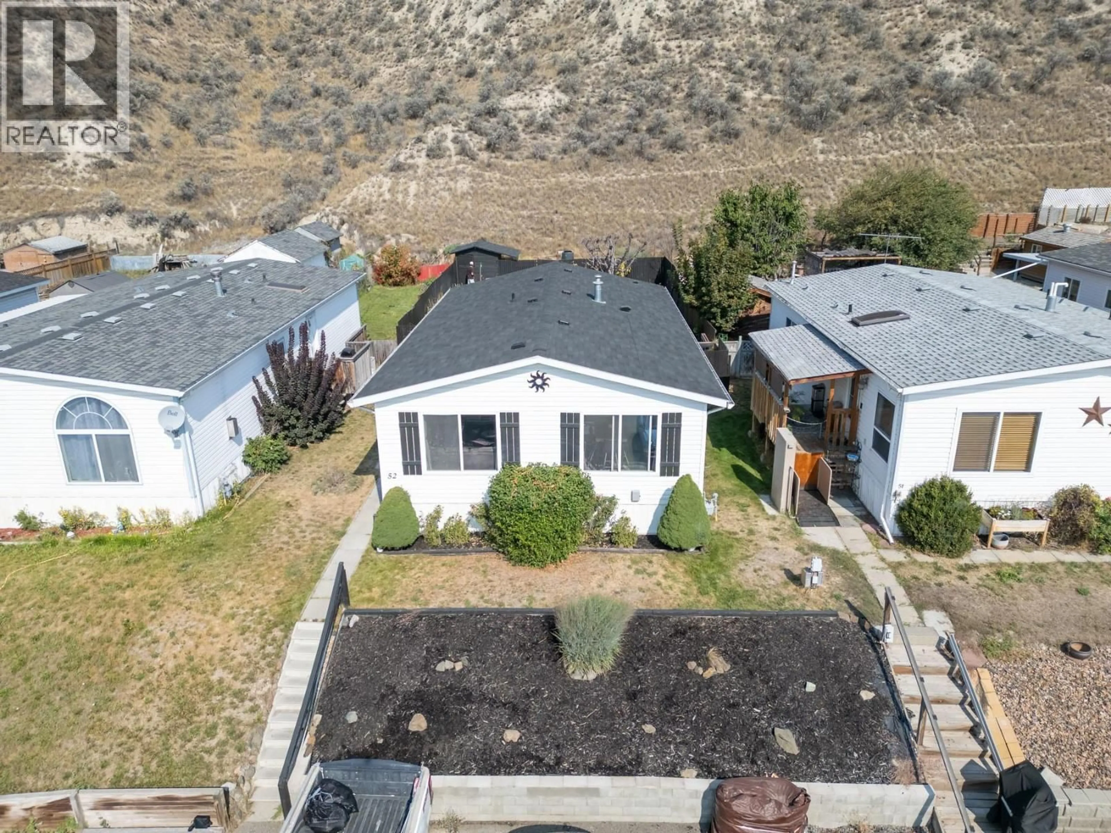 A pic from outside/outdoor area/front of a property/back of a property/a pic from drone, mountain view for 52 - 3099 SHUSWAP  E ROAD, Kamloops British Columbia V2H1T7
