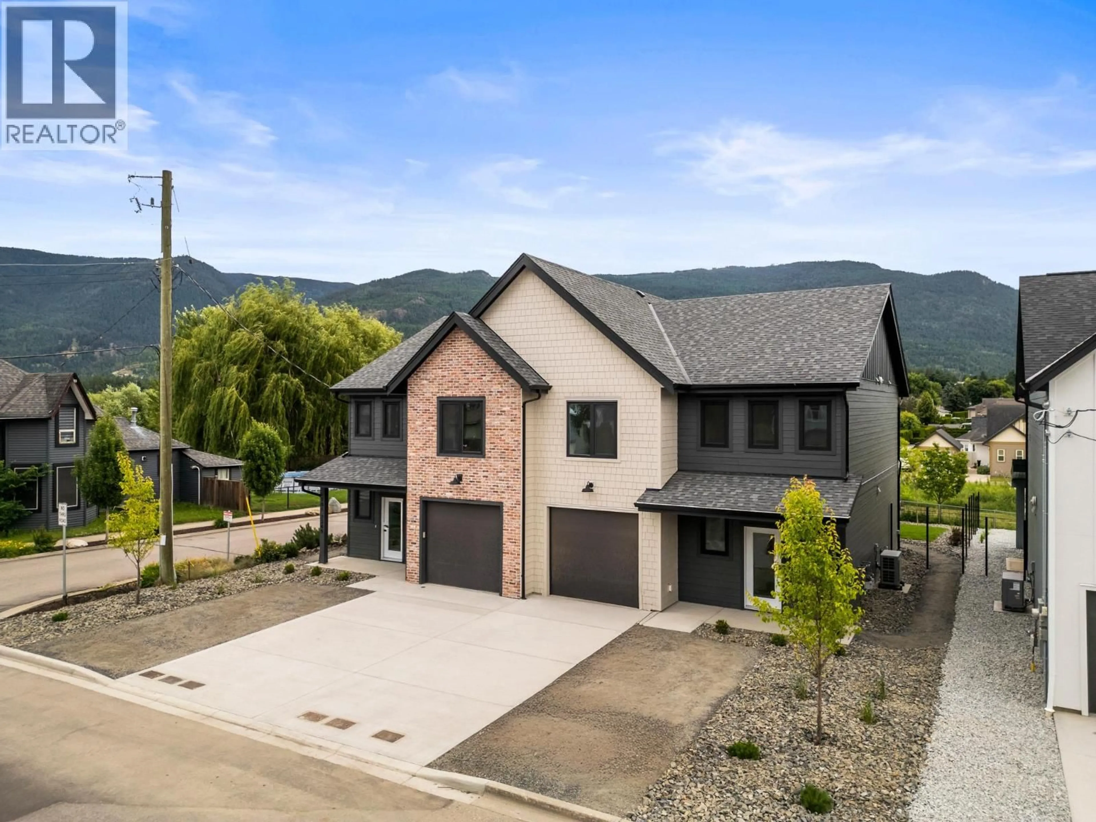 A pic from outside/outdoor area/front of a property/back of a property/a pic from drone, mountain view for 102 - 2345 PATTERSON AVENUE, Armstrong British Columbia V0E1B1