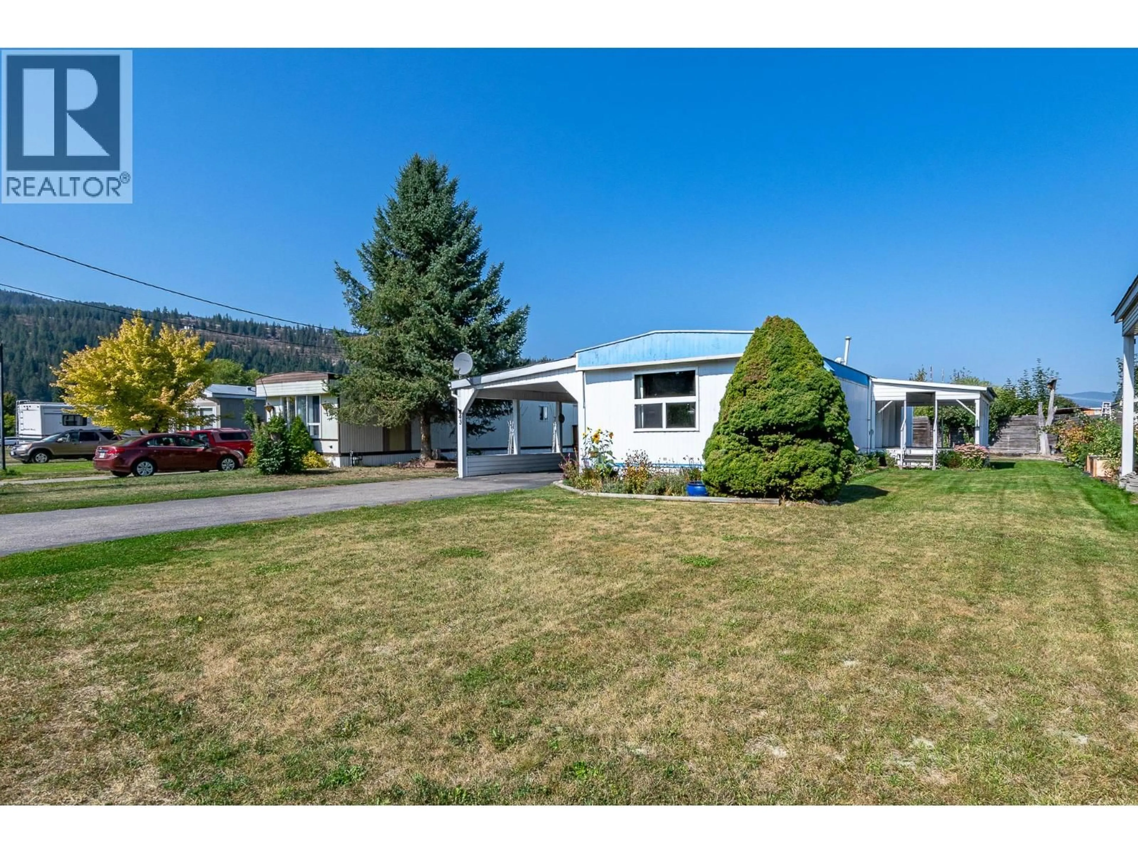A pic from outside/outdoor area/front of a property/back of a property/a pic from drone, unknown for 43 - 136 MEADOW CRESCENT, Enderby British Columbia V0E1V1