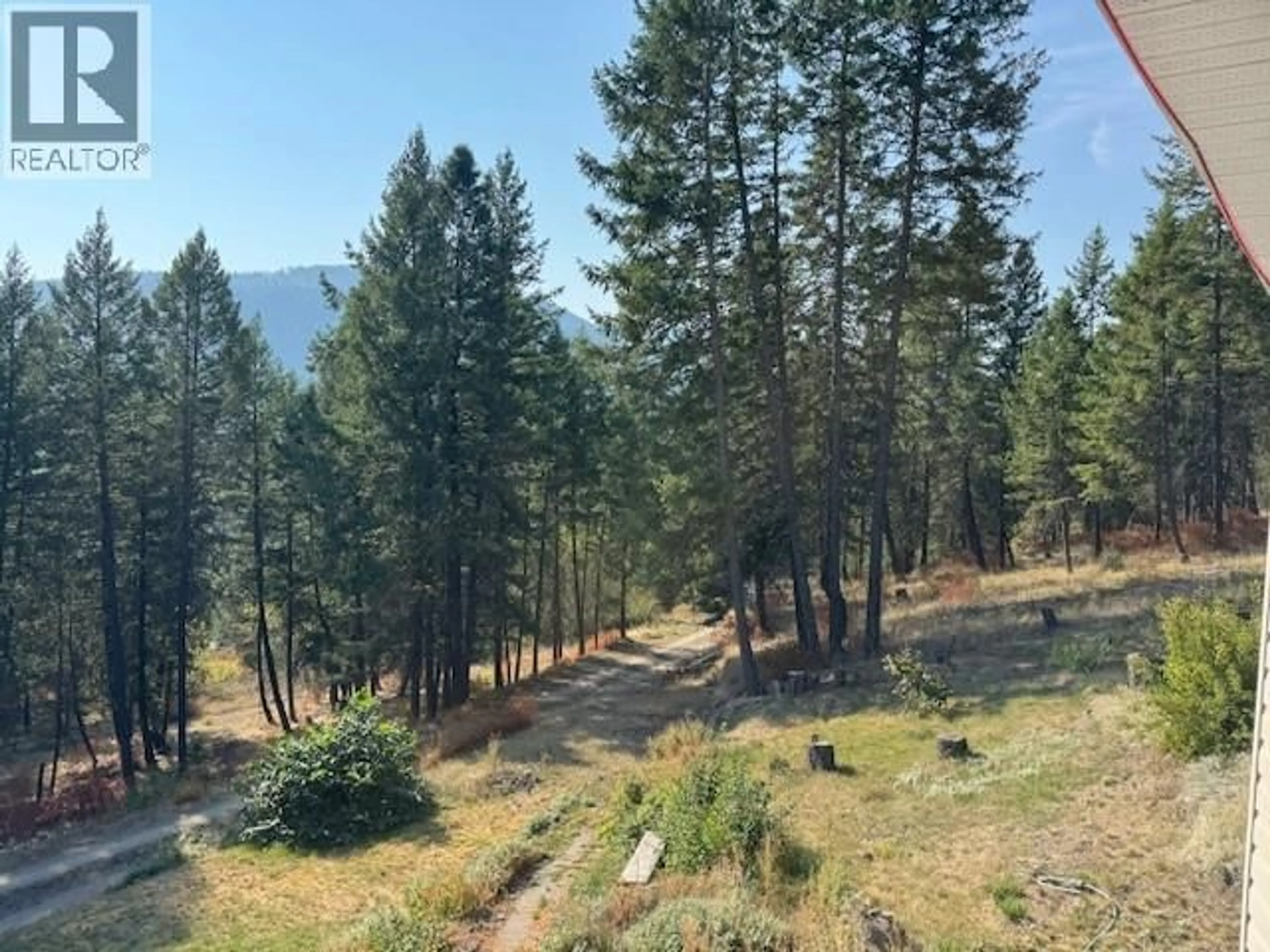 A pic from outside/outdoor area/front of a property/back of a property/a pic from drone, forest/trees view for 3505 CHRISTIAN VALLEY ROAD, Westbridge British Columbia V0H1Y0