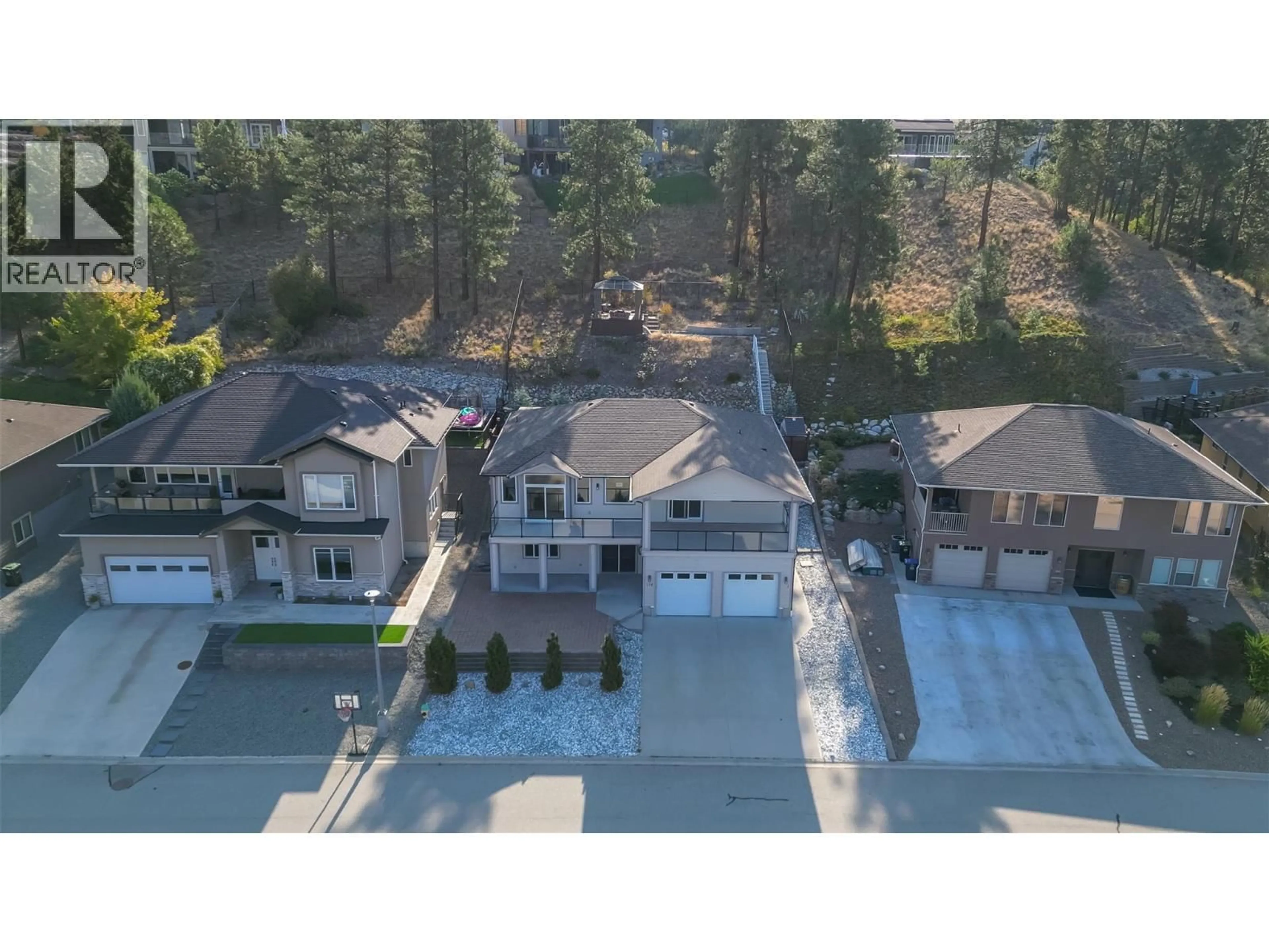 A pic from outside/outdoor area/front of a property/back of a property/a pic from drone, street for 124 BARTON COURT, Penticton British Columbia V2A9A8