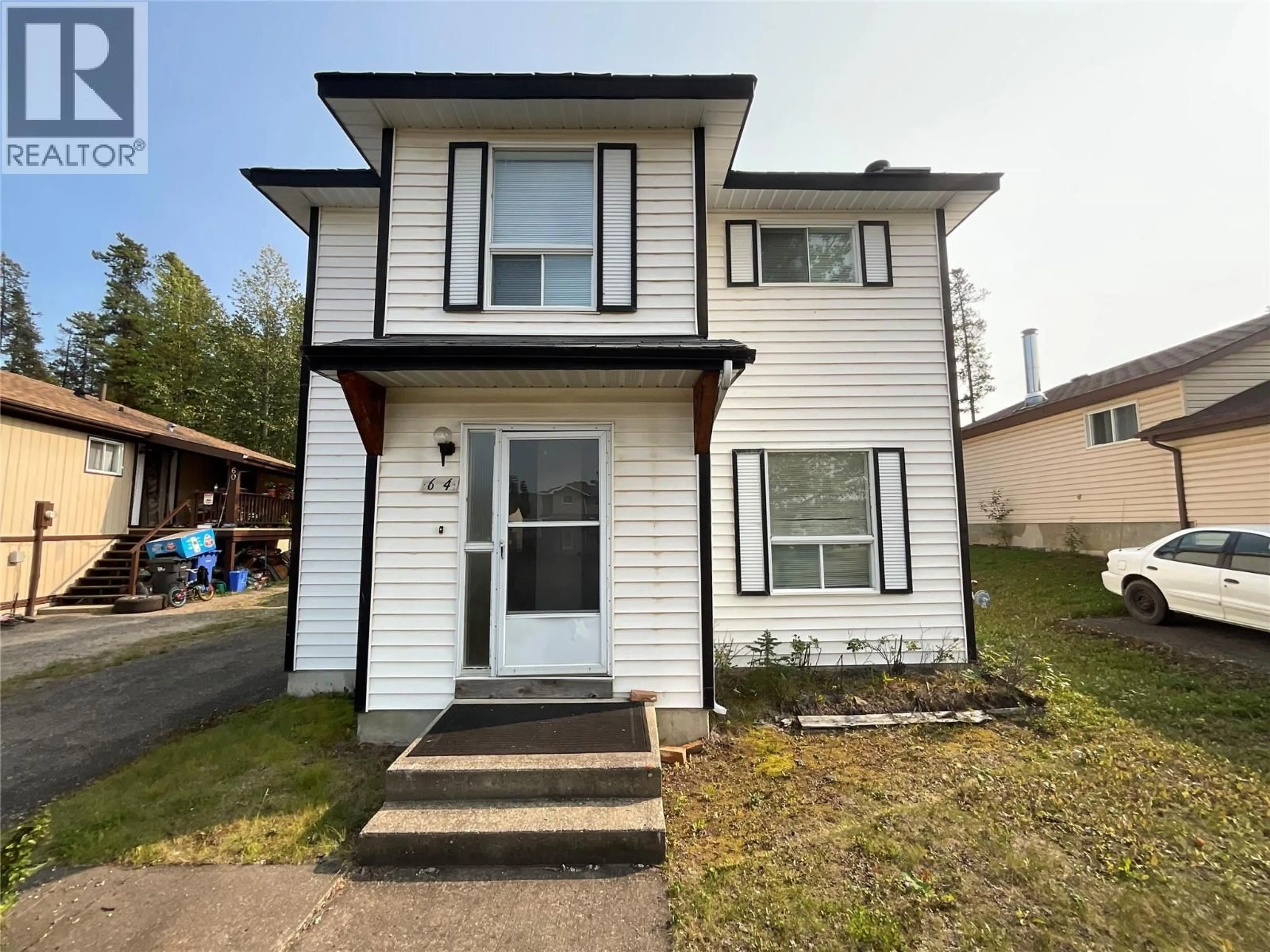 Home with vinyl exterior material, street for 64 MERRICK PLACE, Tumbler Ridge British Columbia V0C2W0