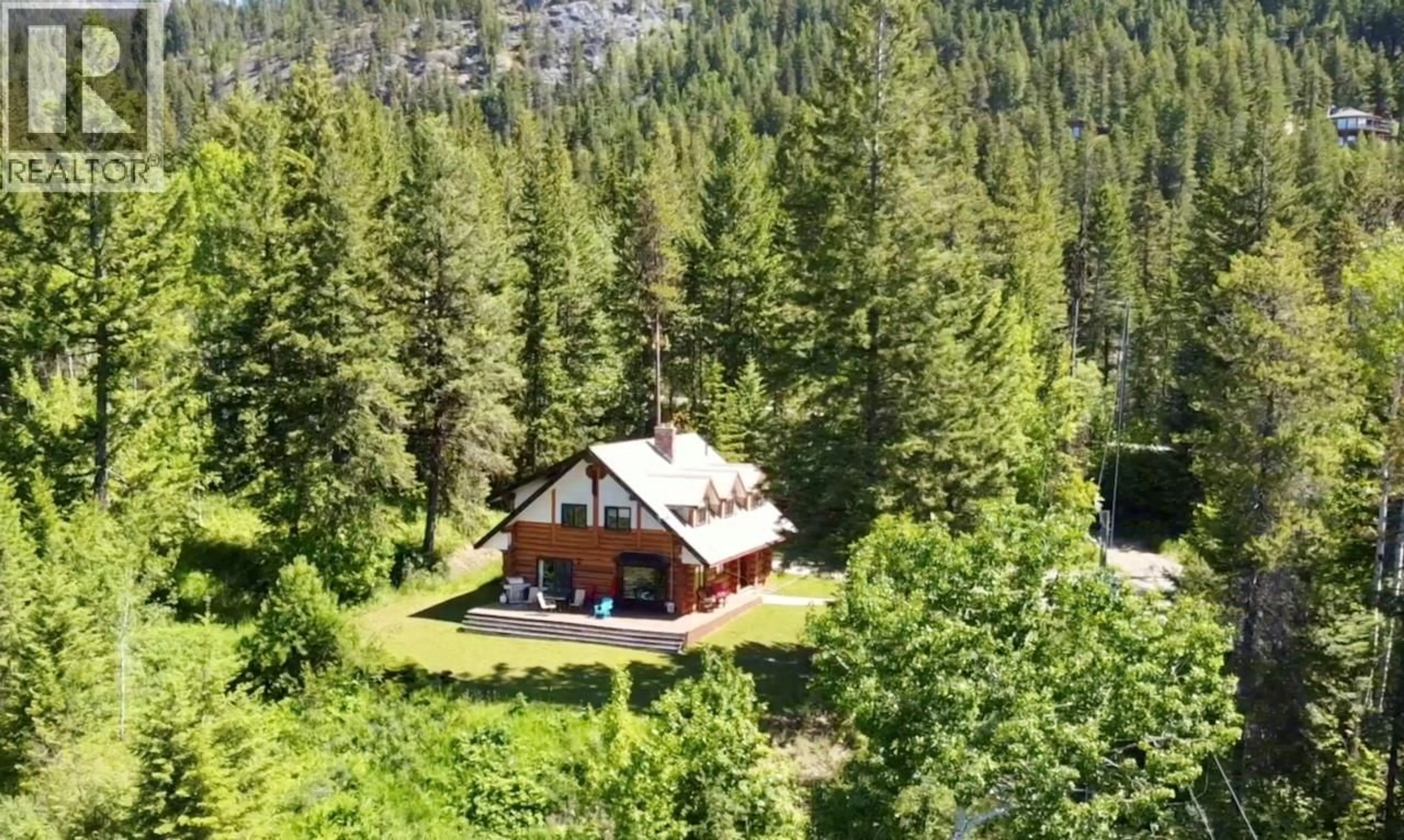 A pic from outside/outdoor area/front of a property/back of a property/a pic from drone, unknown for 1445 BLACK BEAR DRIVE, Golden British Columbia V0A1H7