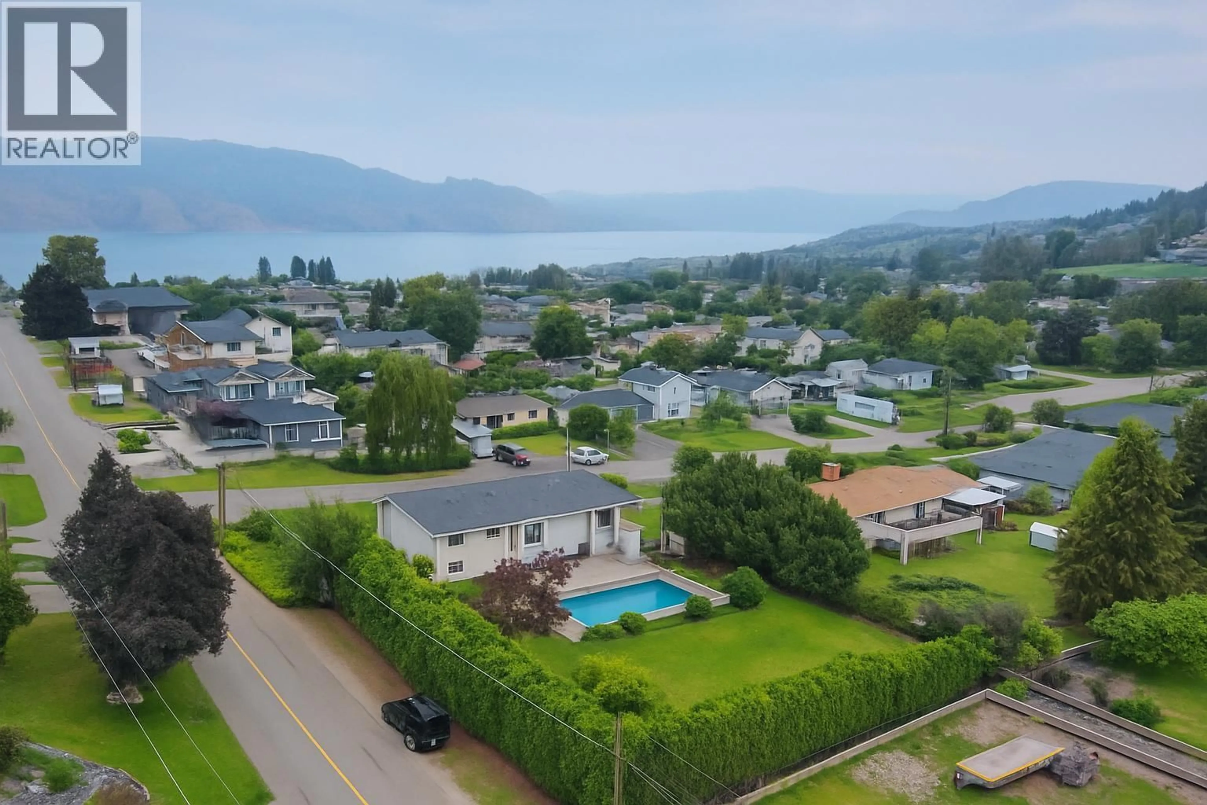 A pic from outside/outdoor area/front of a property/back of a property/a pic from drone, mountain view for 810 WESTBROOK DRIVE, West Kelowna British Columbia V1Z1R3