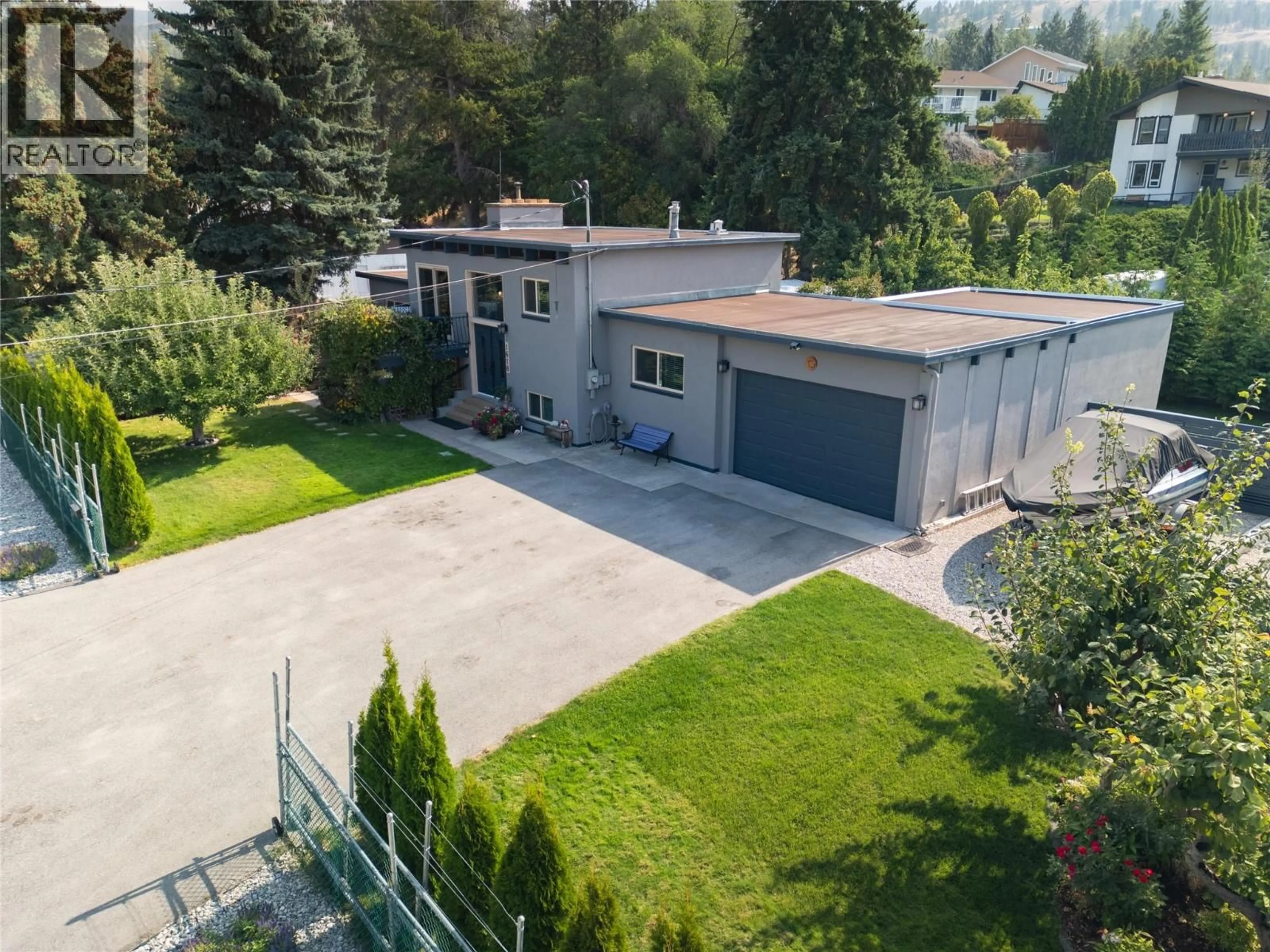A pic from outside/outdoor area/front of a property/back of a property/a pic from drone, street for 1618 DUNCAN AVE E AVENUE, Penticton British Columbia V2A2X9