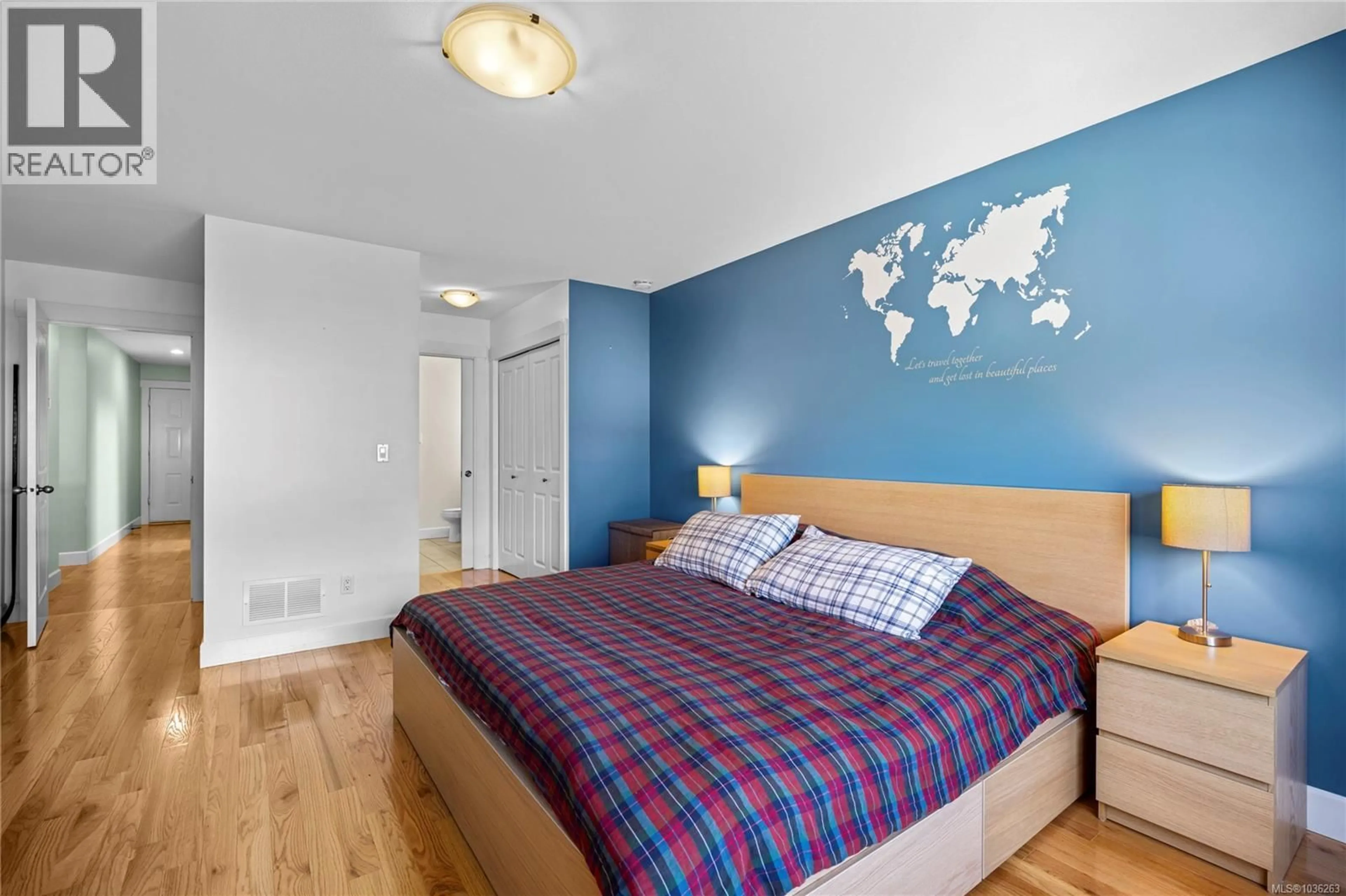 Bedroom with bed, wood/laminate floor for 1743 FLAGSTONE ROAD, Nanaimo British Columbia V9X1Y1
