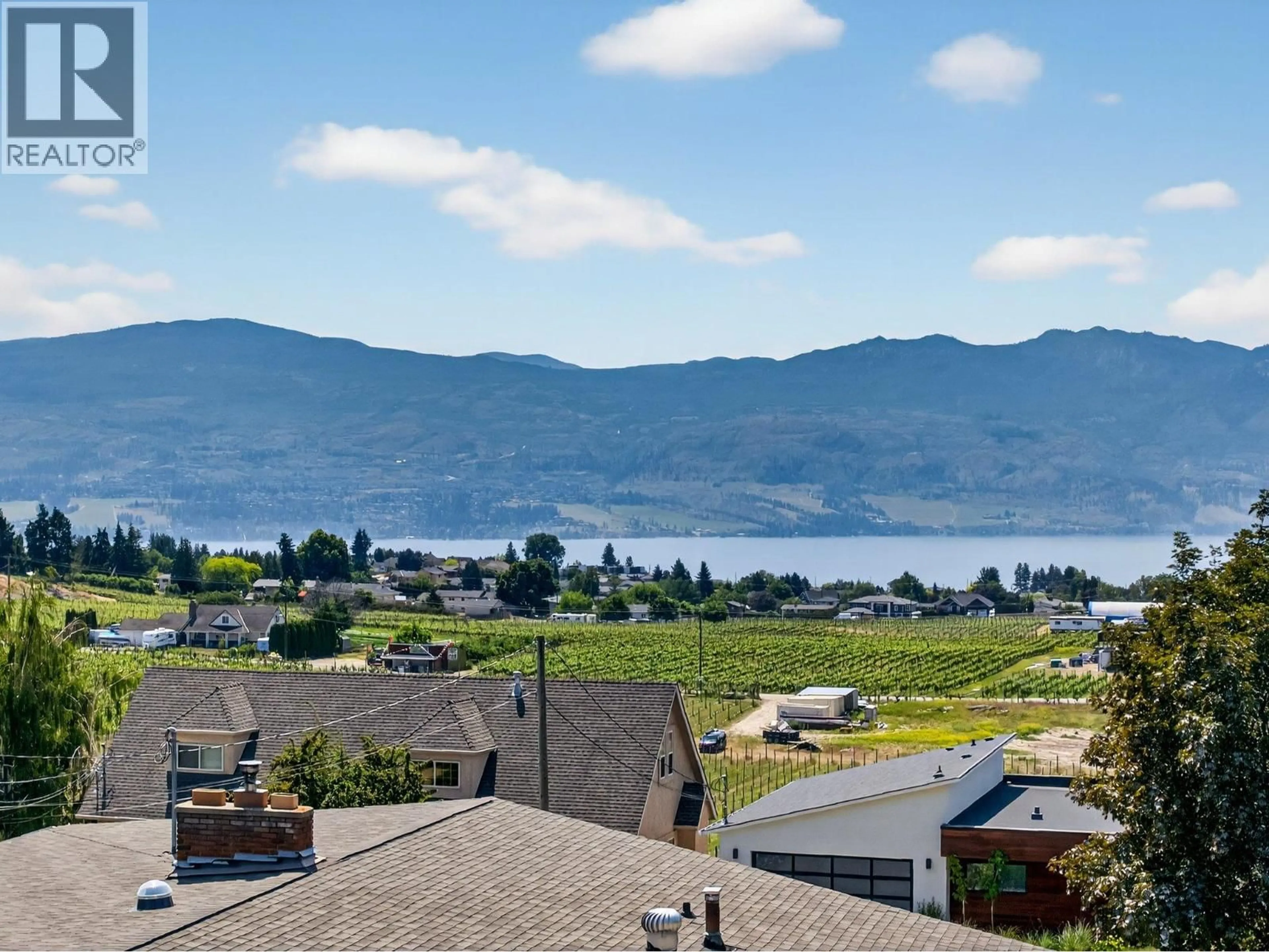 A pic from outside/outdoor area/front of a property/back of a property/a pic from drone, water/lake/river/ocean view for 2715 BOUCHERIE ROAD, West Kelowna British Columbia V1Z2G3