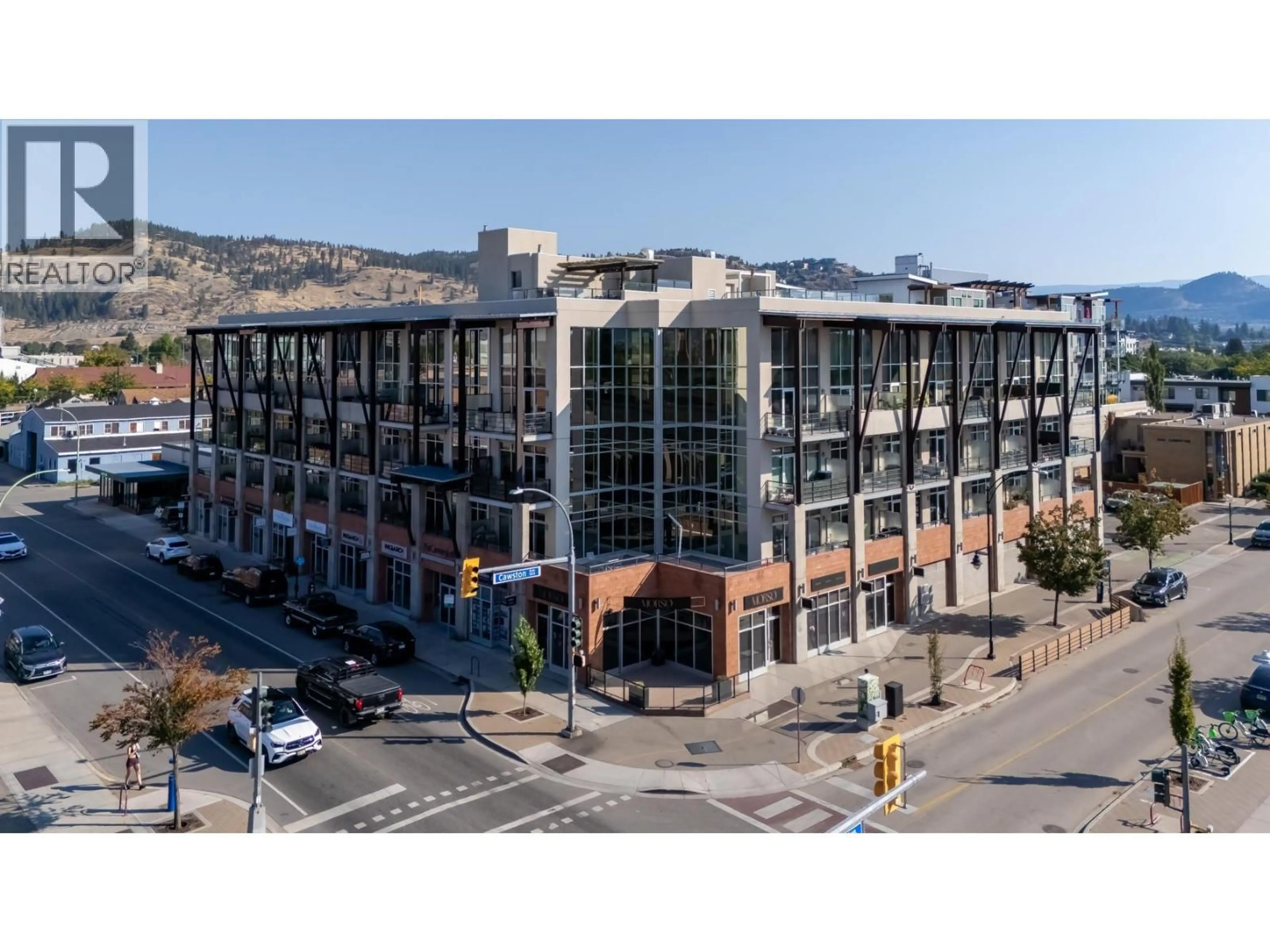 A pic from outside/outdoor area/front of a property/back of a property/a pic from drone, building for 412 - 1289 ELLIS STREET, Kelowna British Columbia V1Y9X6