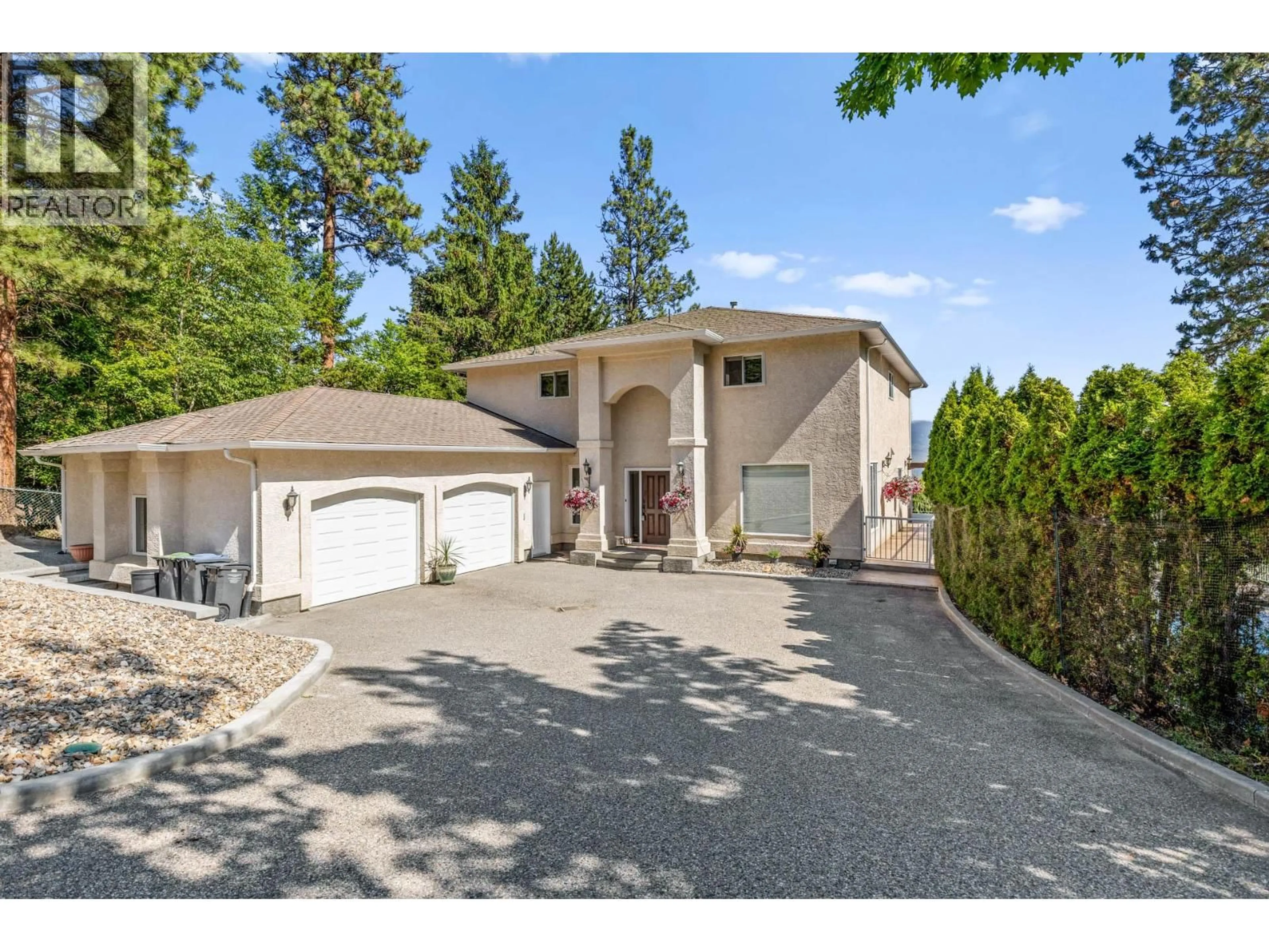 A pic from outside/outdoor area/front of a property/back of a property/a pic from drone, street for 1015 GUEST ROAD, West Kelowna British Columbia V1Z3L2