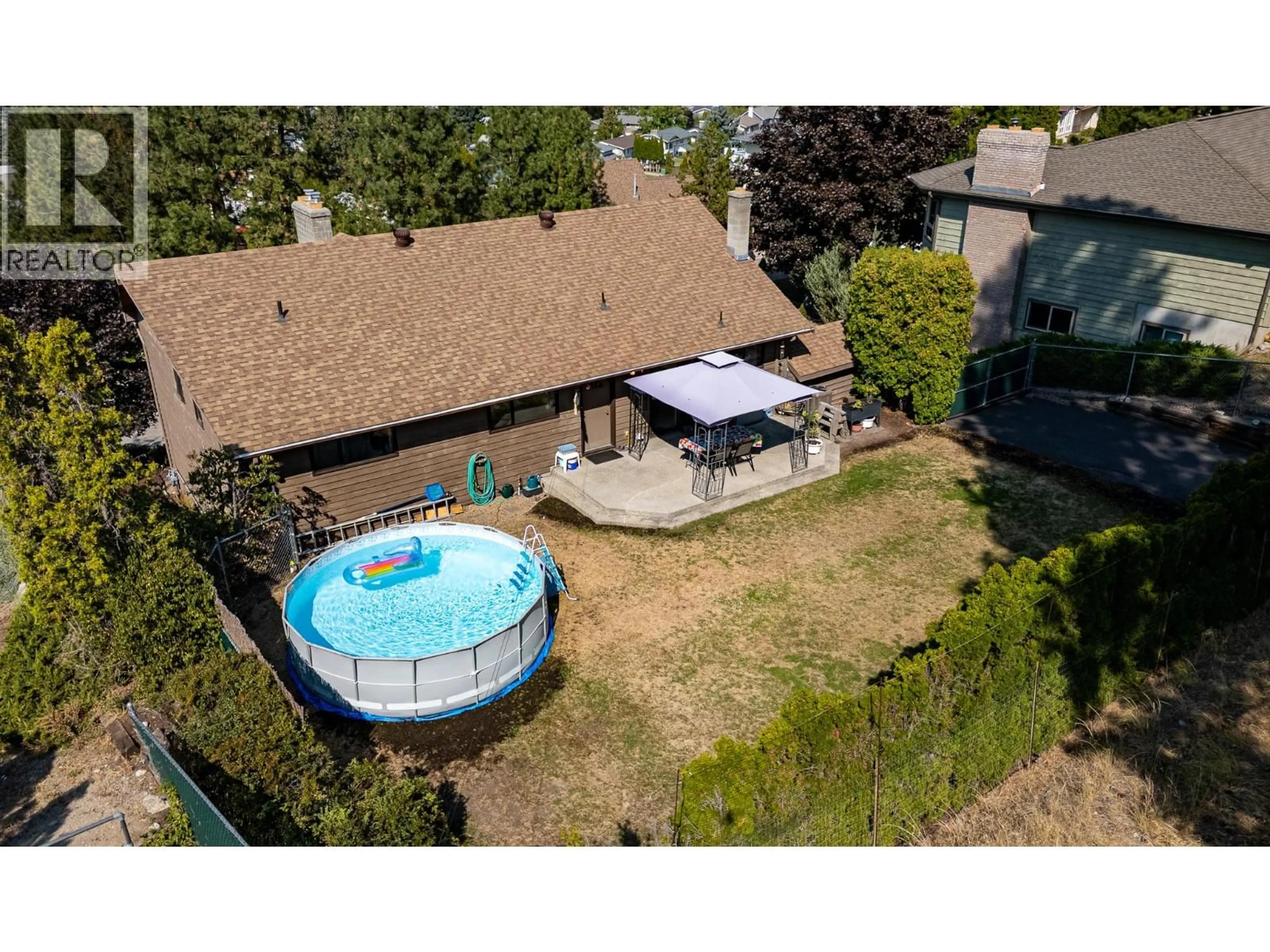 A pic from outside/outdoor area/front of a property/back of a property/a pic from drone, unknown for 179 DEWDNEY CRESCENT, Penticton British Columbia V2A7N2