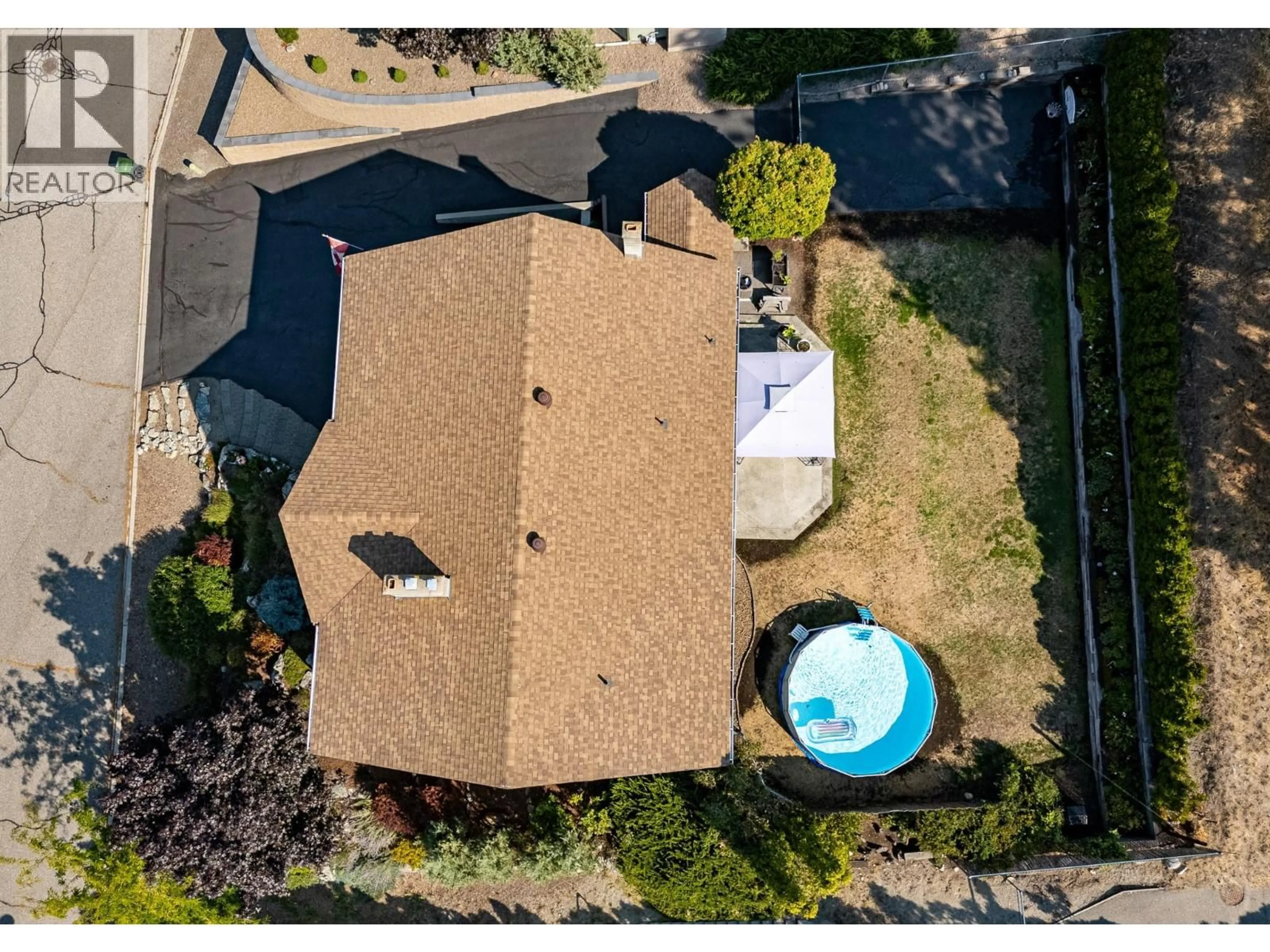 A pic from outside/outdoor area/front of a property/back of a property/a pic from drone, unknown for 179 DEWDNEY CRESCENT, Penticton British Columbia V2A7N2