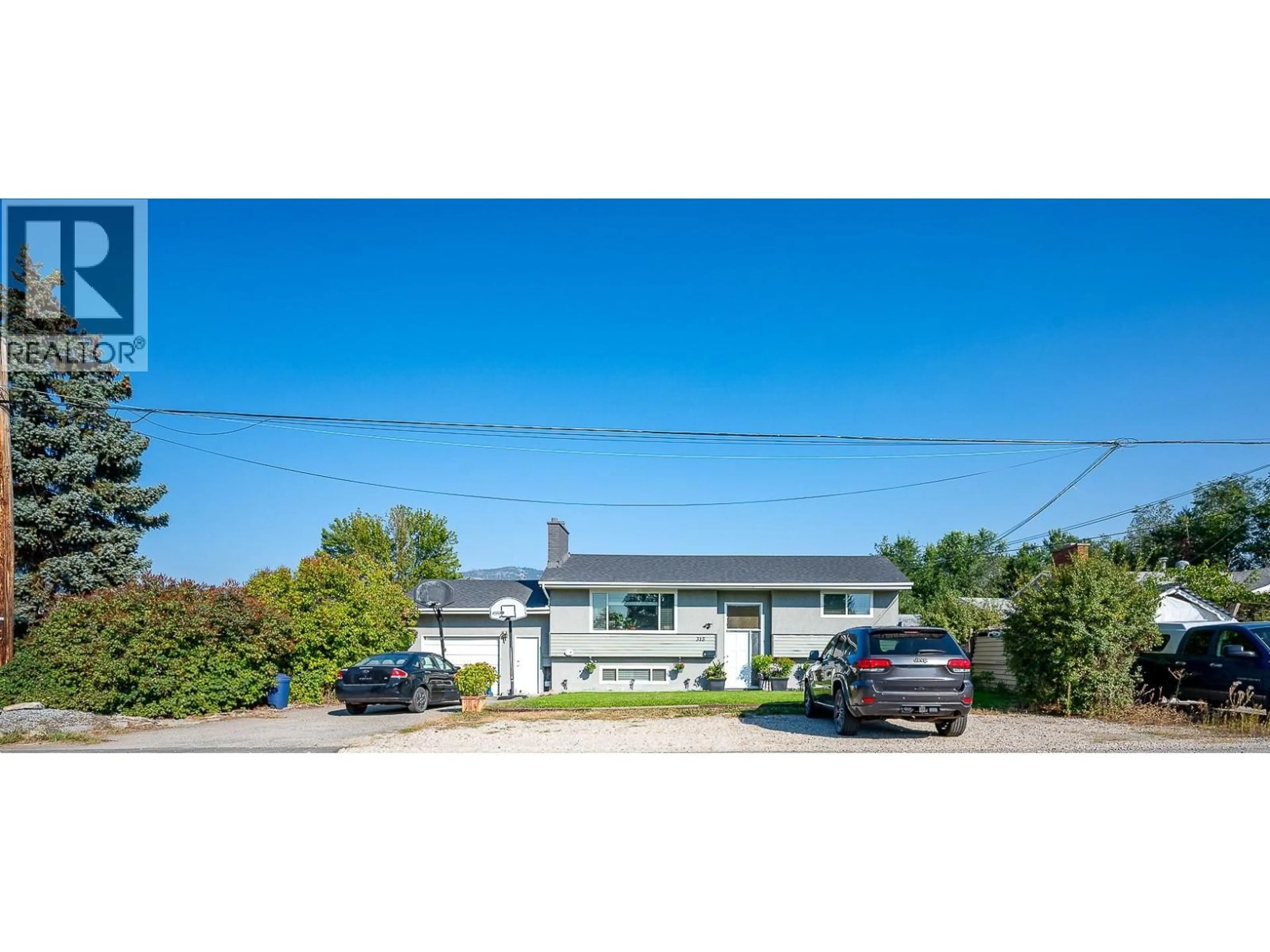 A pic from outside/outdoor area/front of a property/back of a property/a pic from drone, street for 315 PRIOR ROAD SOUTH, Kelowna British Columbia V1X2Y3